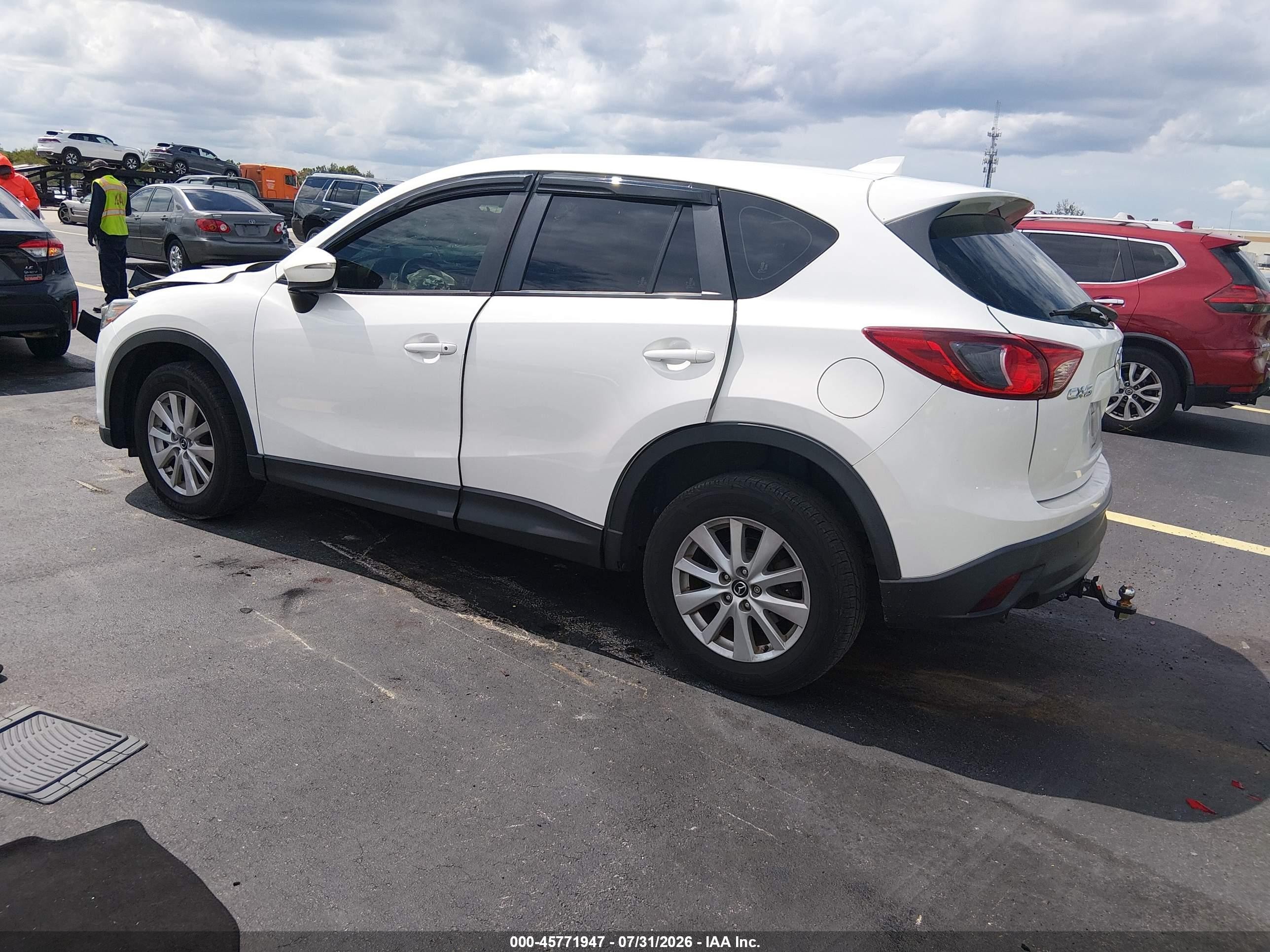 2016 Mazda CX-5 VIN JM3KE2BY9G0689093 IAAI salvage auction — Side, Rebuildable (Florida), sold $1,400 on 2026-09-14 (photo 3)