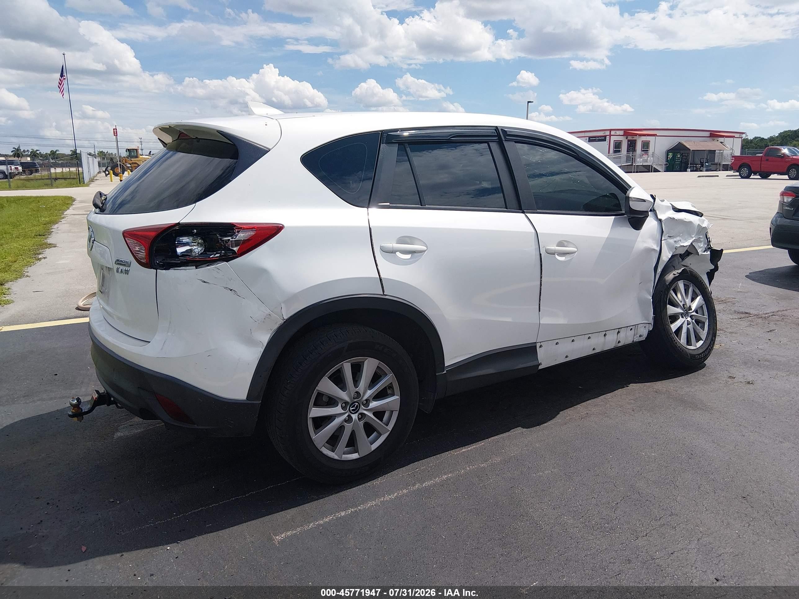 2016 Mazda CX-5 VIN JM3KE2BY9G0689093 IAAI salvage auction — Side, Rebuildable (Florida), sold $1,400 on 2026-09-14 (photo 4)