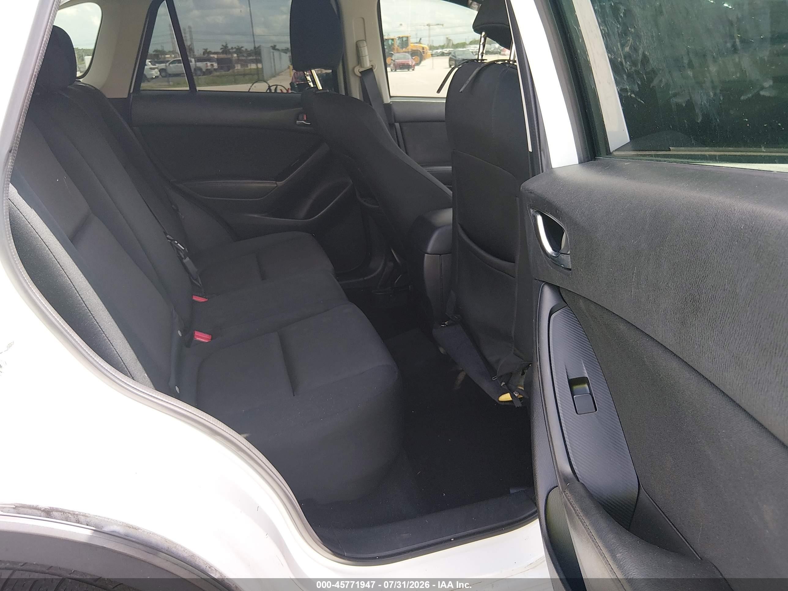 2016 Mazda CX-5 VIN JM3KE2BY9G0689093 IAAI salvage auction — Side, Rebuildable (Florida), sold $1,400 on 2026-09-14 (photo 8)