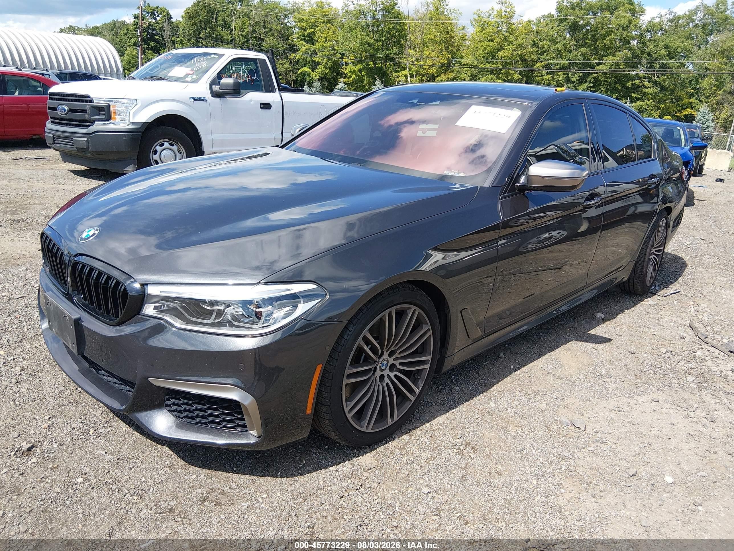 2020 BMW M550i xDrive VIN WBAJS7C05LCD09131 IAAI salvage auction — Rear End, Salvage (New Jersey), sold $14,300 on 2026-09-18 (photo 2)