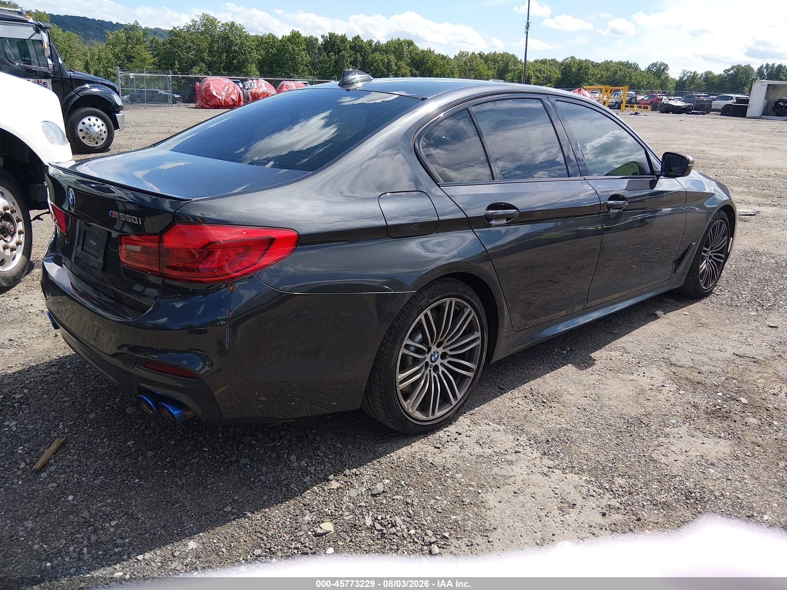 2020 BMW M550i xDrive VIN WBAJS7C05LCD09131 IAAI salvage auction — Rear End, Salvage (New Jersey), sold $14,300 on 2026-09-18 (photo 4)