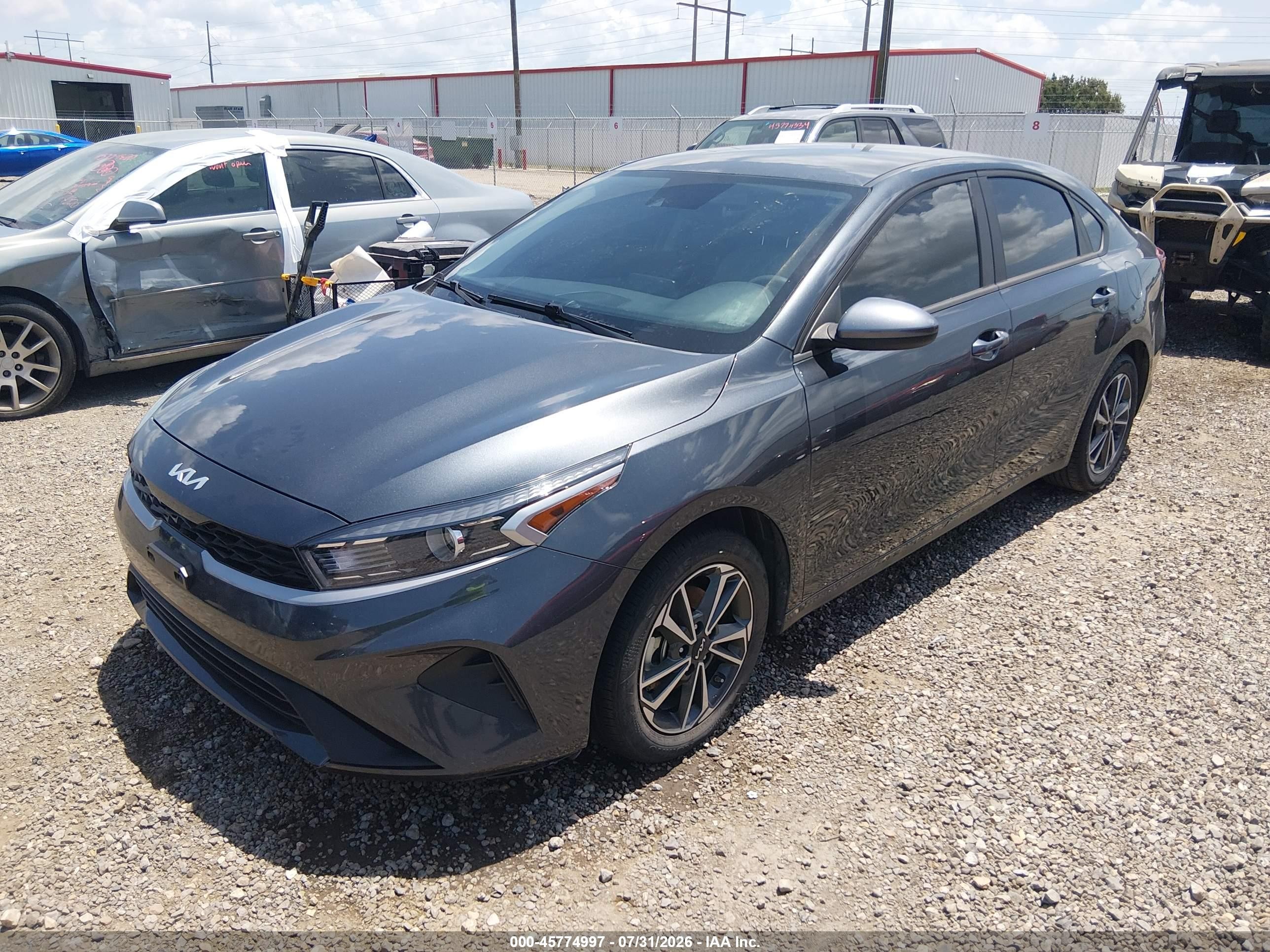 2023 Kia Forte VIN 3KPF24AD2PE645201 IAAI salvage auction — Water/Flood, Certificate Of Destruction (Louisiana), sold $3,400 on 2026-09-04 (photo 2)