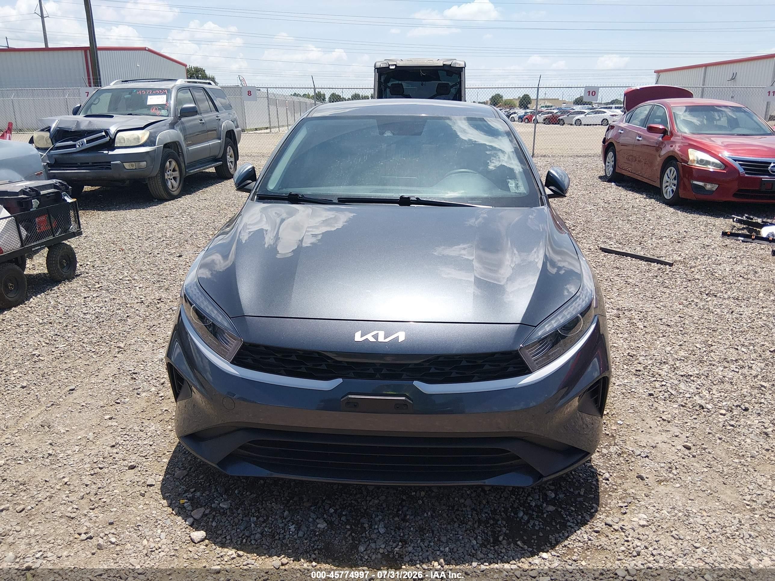 2023 Kia Forte VIN 3KPF24AD2PE645201 IAAI salvage auction — Water/Flood, Certificate Of Destruction (Louisiana), sold $3,400 on 2026-09-04 (photo 6)