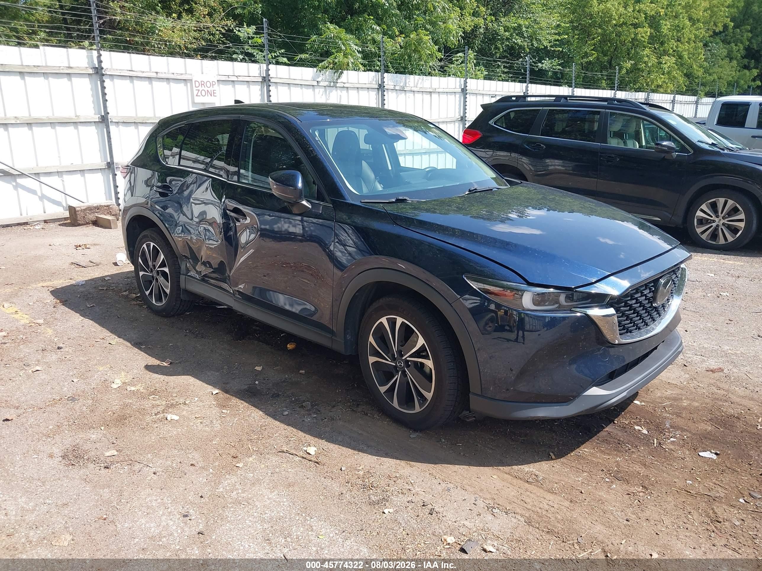 2022 Mazda Cx-5 VIN JM3KFBDM4N0535461 IAAI salvage auction — Side, Clear (Michigan), sold $9,800 on 2026-09-26 (photo 1)