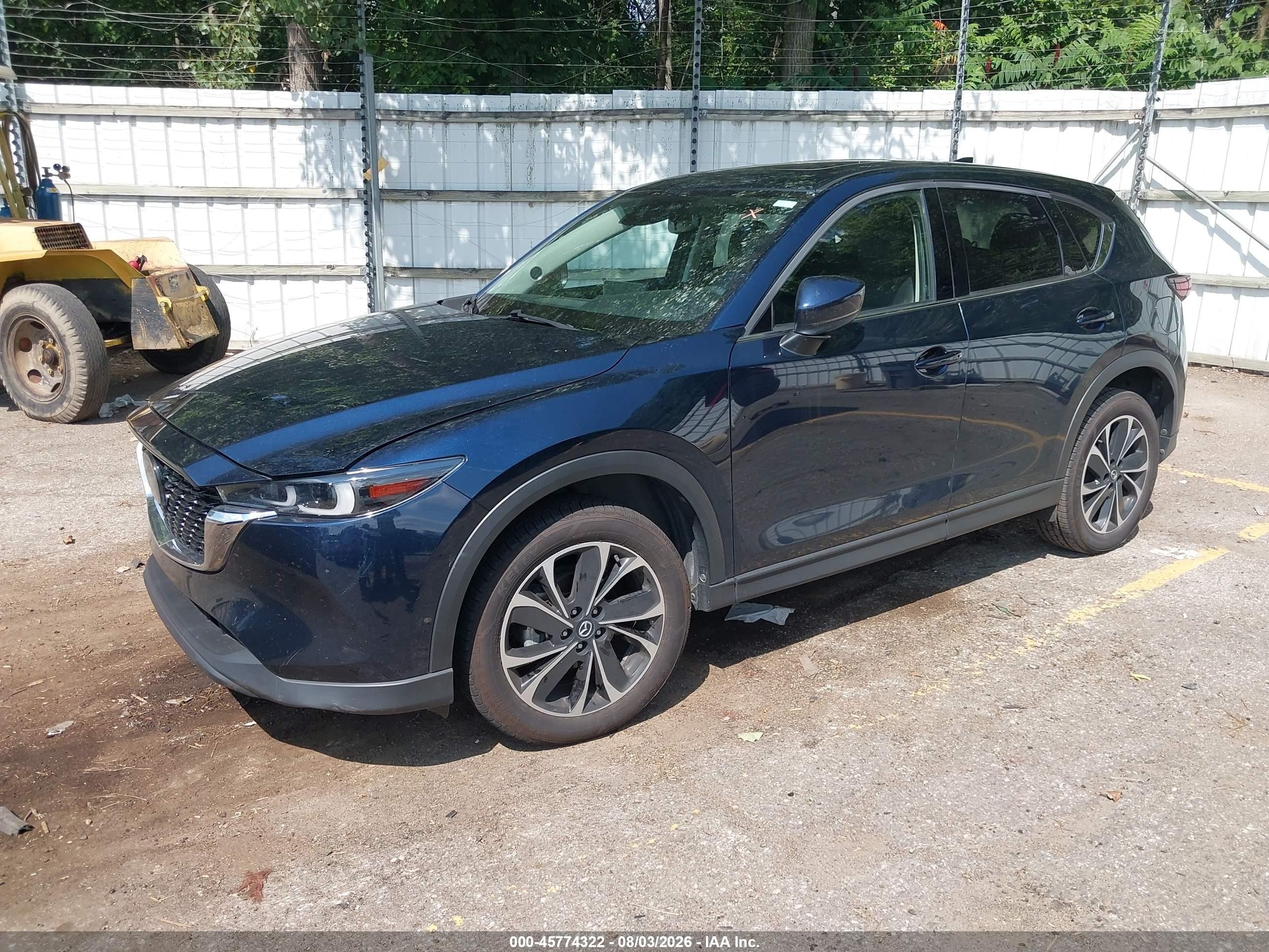 2022 Mazda Cx-5 VIN JM3KFBDM4N0535461 IAAI salvage auction — Side, Clear (Michigan), sold $9,800 on 2026-09-26 (photo 2)