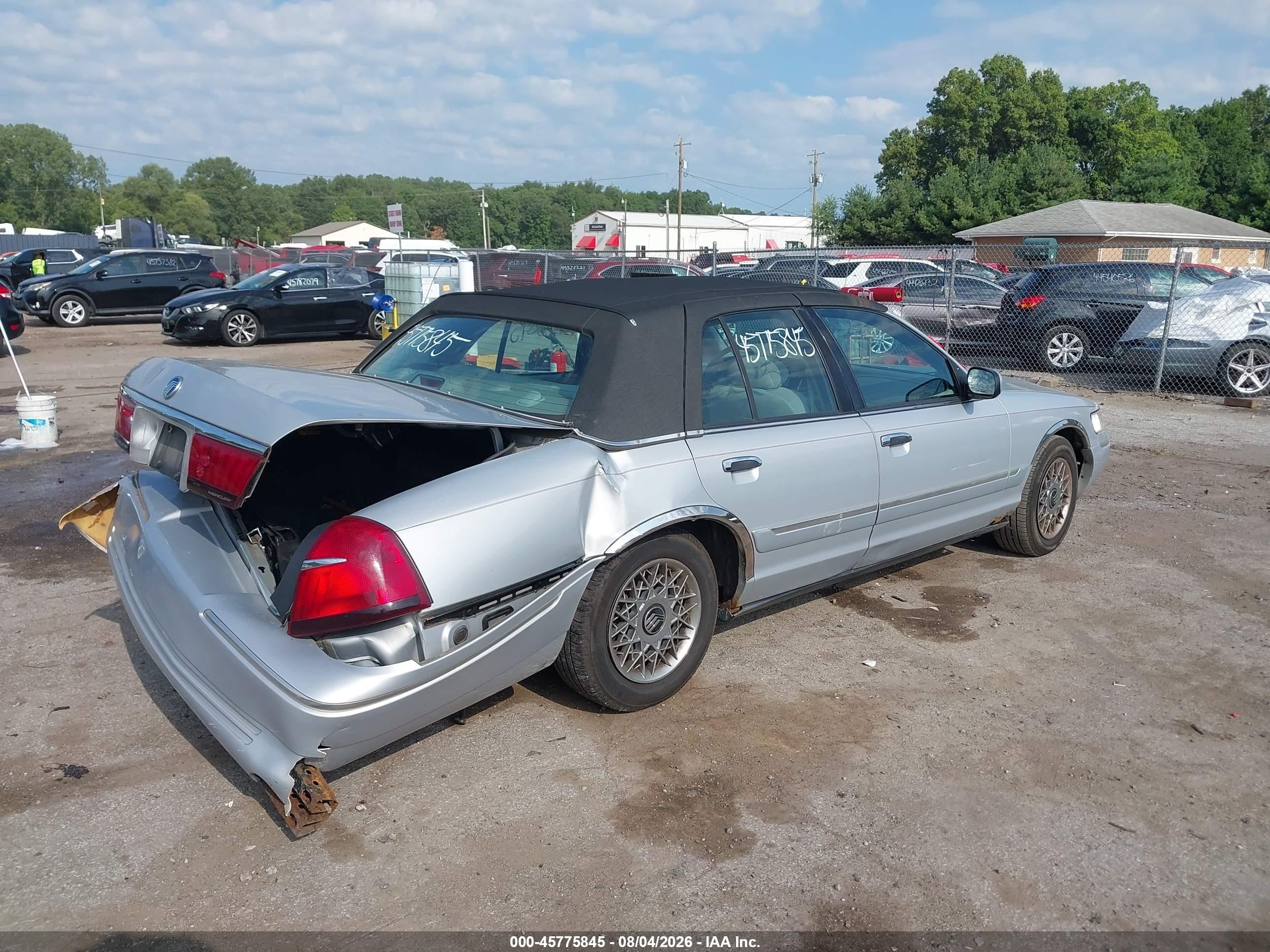 2000 Mercury Grand marquis VIN 2MEFM74W7YX646976 IAAI salvage auction — Rear End, Clear (Indiana), sold $350 on 2026-09-11 (photo 4)