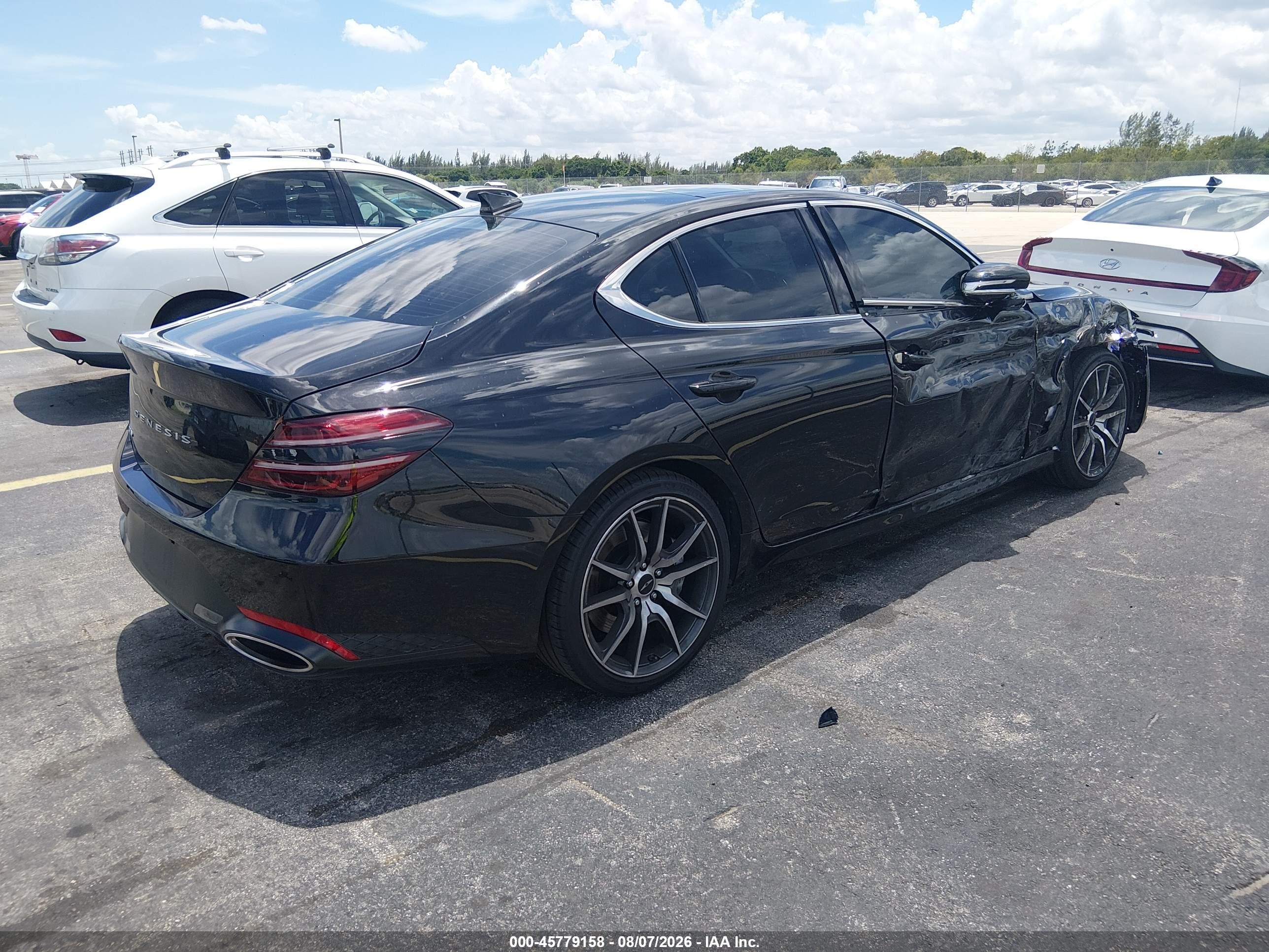 2026 Genesis G70 VIN KMTG24SC6TU160129 IAAI salvage auction — Side, Rebuildable (Florida), sold $10,100 on 2026-09-13 (photo 4)
