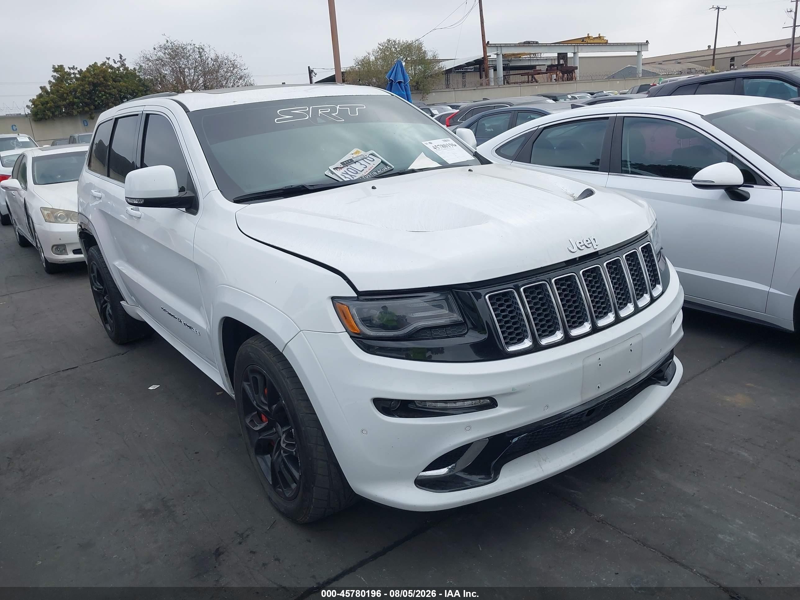2015 Jeep Grand Cherokee VIN 1C4RJFDJ5FC917999 IAAI salvage auction — Vandalized, Salvage Certificate (California), sold $5,600 on 2026-09-13 (photo 1)