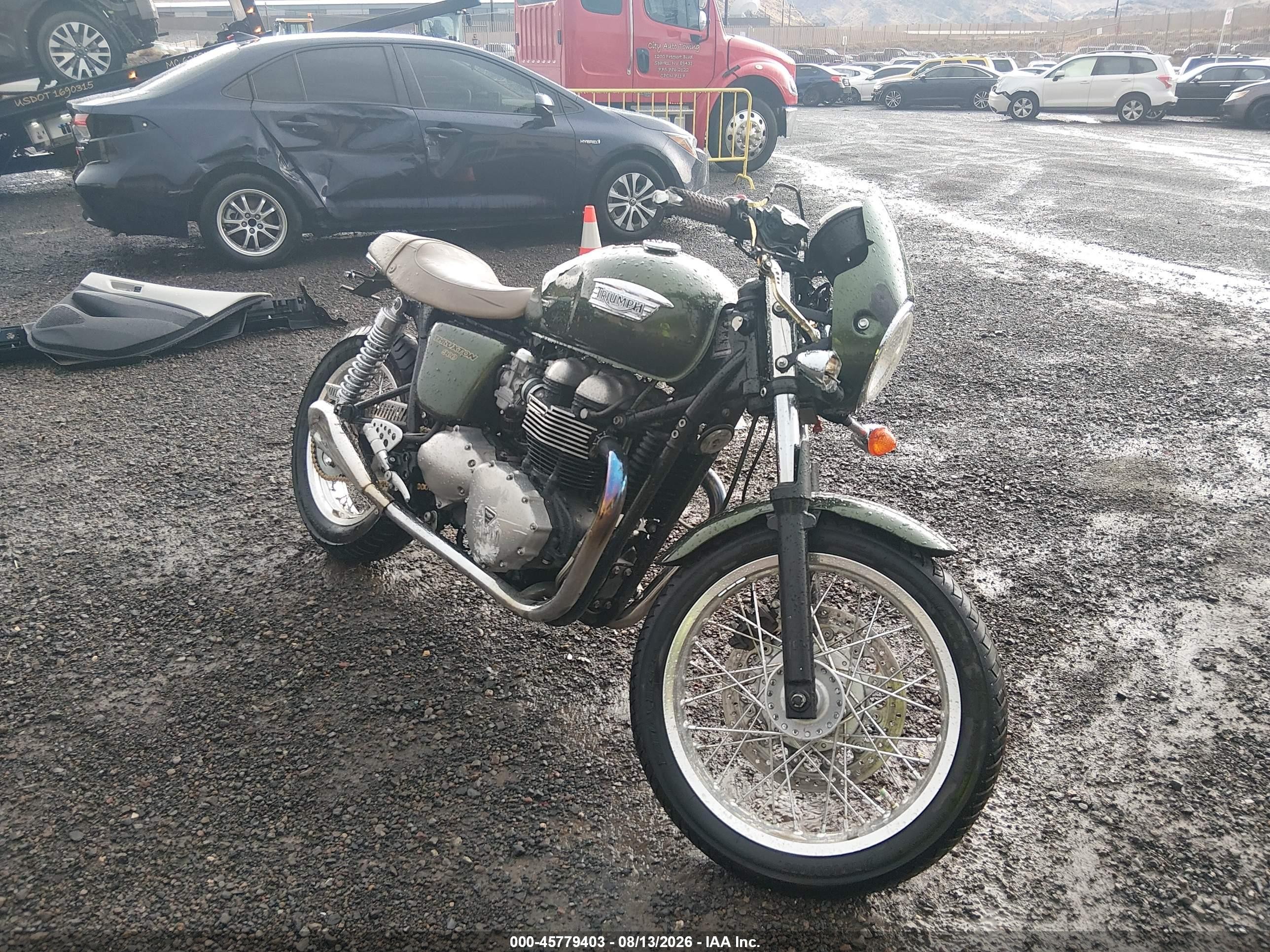 2016 Triumph motorcycle Thruxton VIN SMT920K10GT733621 IAAI salvage auction — Side, Salvage (Nevada), sold $550 on 2026-09-16 (photo 1)
