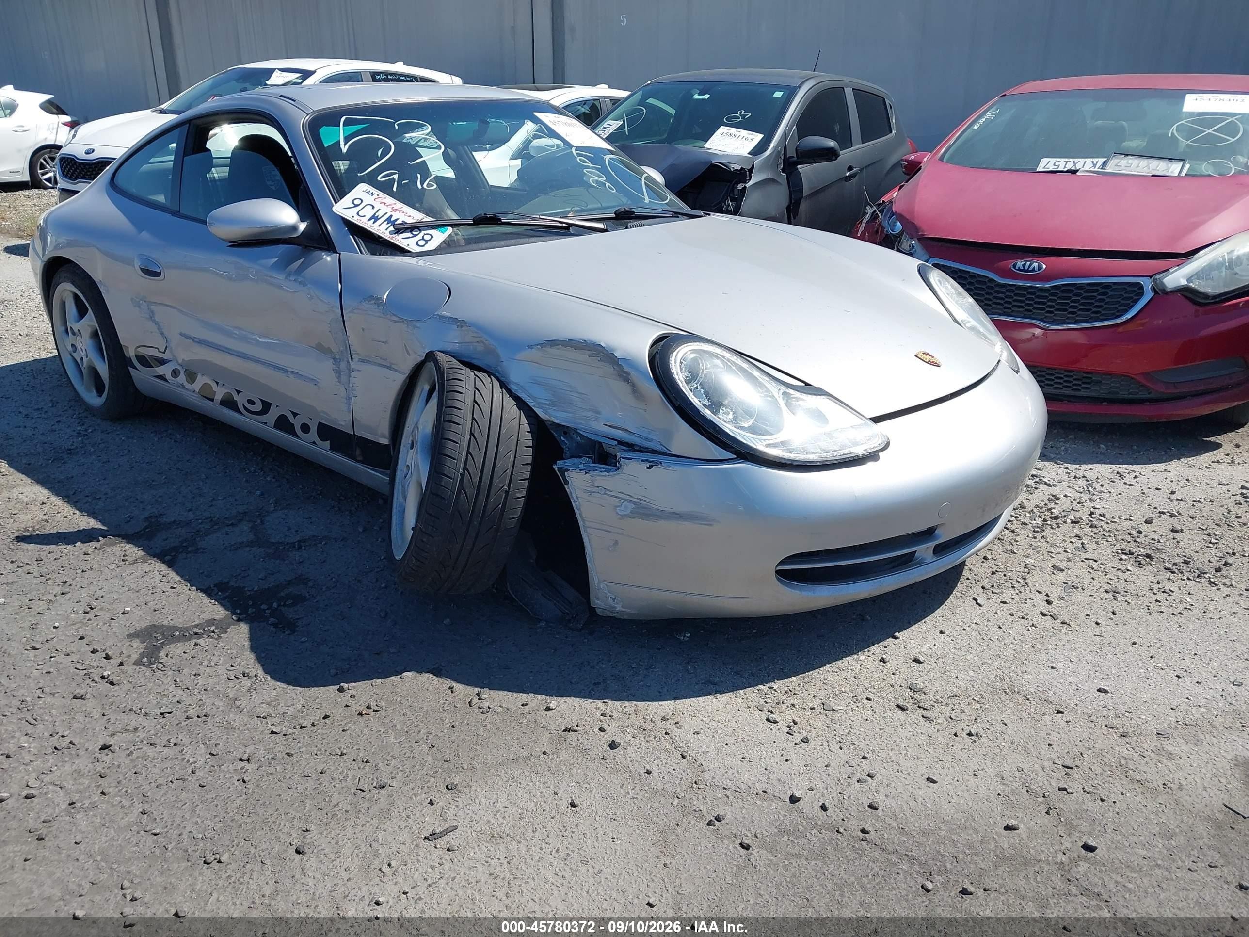 2000 Porsche 911 VIN WP0AA2992YS620900 IAAI salvage auction — Side, Salvage Certificate (California), sold $4,150 on 2026-09-12 (photo 1)