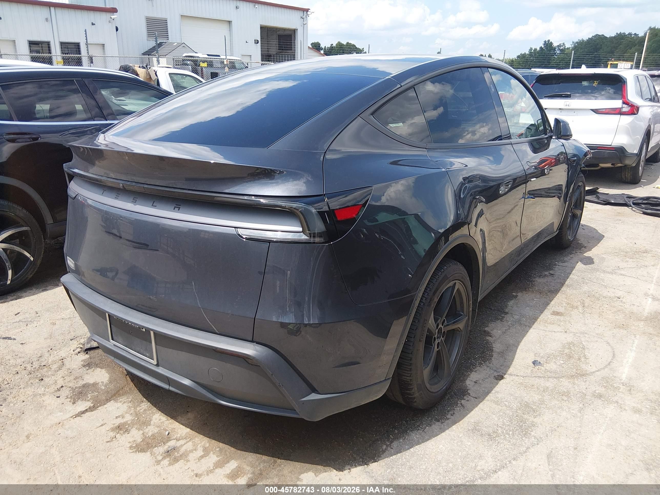 2026 Tesla Model y VIN 7SAYGDED9TA437485 IAAI salvage auction — Unknown, Salvage (North Carolina), sold $22,200 on 2026-09-10 (photo 4)