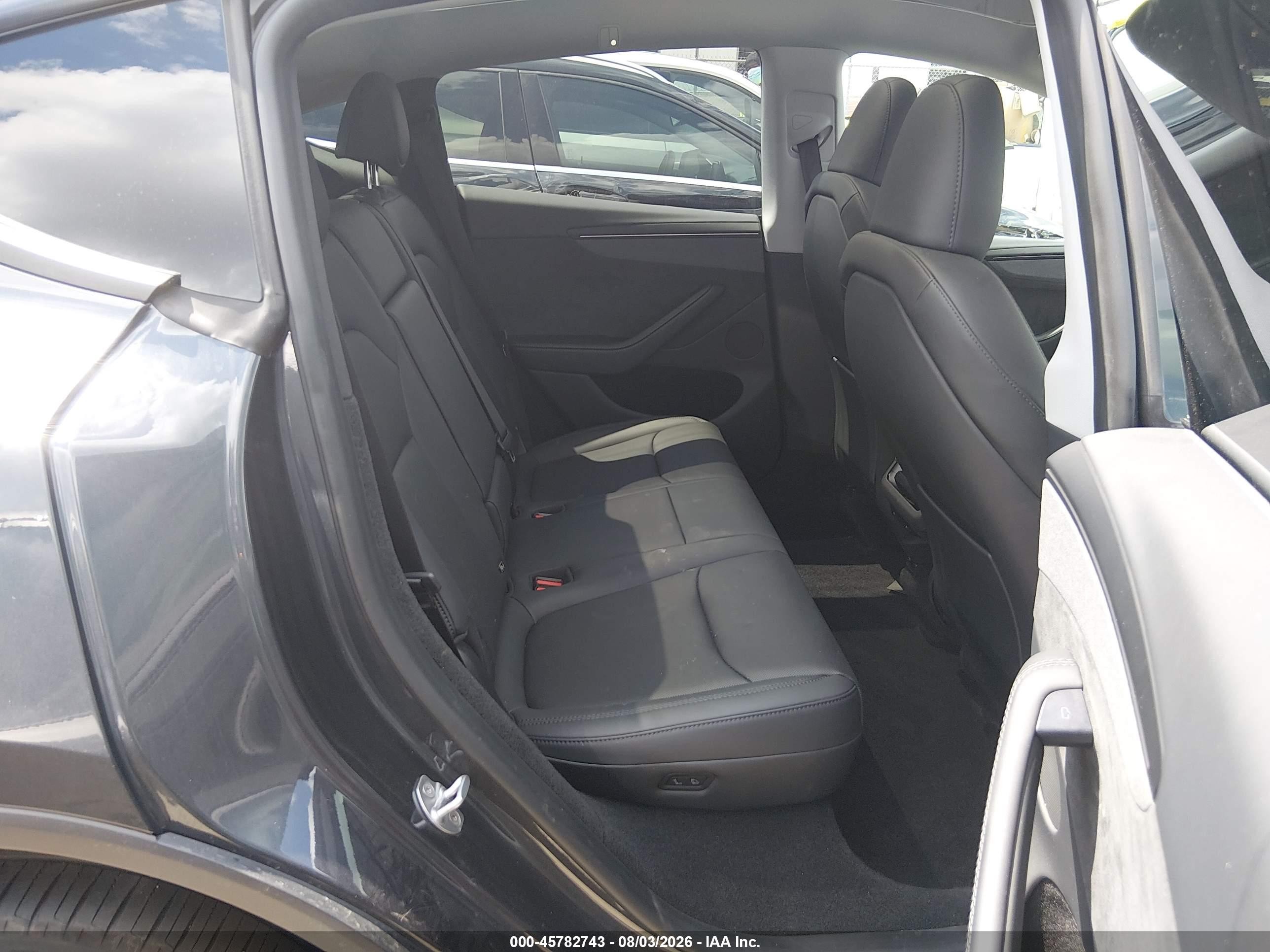 2026 Tesla Model y VIN 7SAYGDED9TA437485 IAAI salvage auction — Unknown, Salvage (North Carolina), sold $22,200 on 2026-09-10 (photo 8)