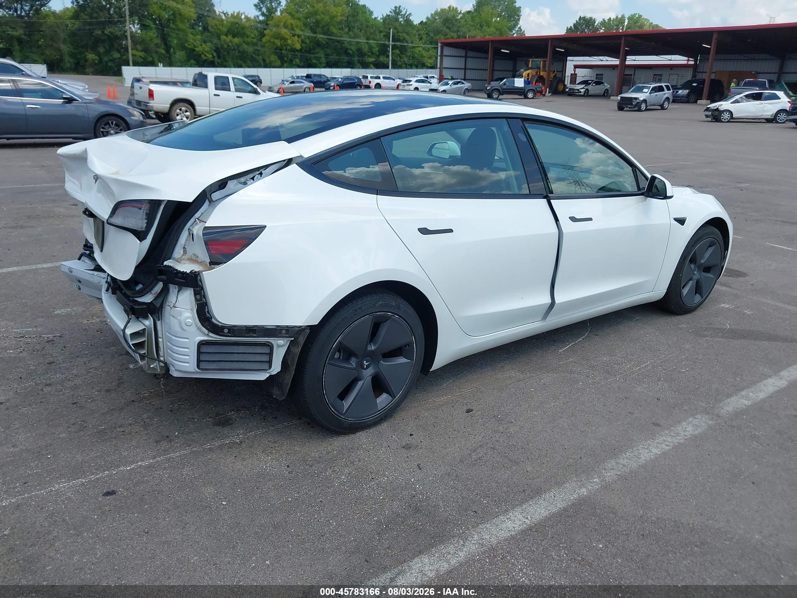 2023 Tesla Model 3 VIN 5YJ3E1EA2PF465249 IAAI salvage auction — Rear End, Salvage (Mississippi), sold $7,600 on 2026-09-10 (photo 4)