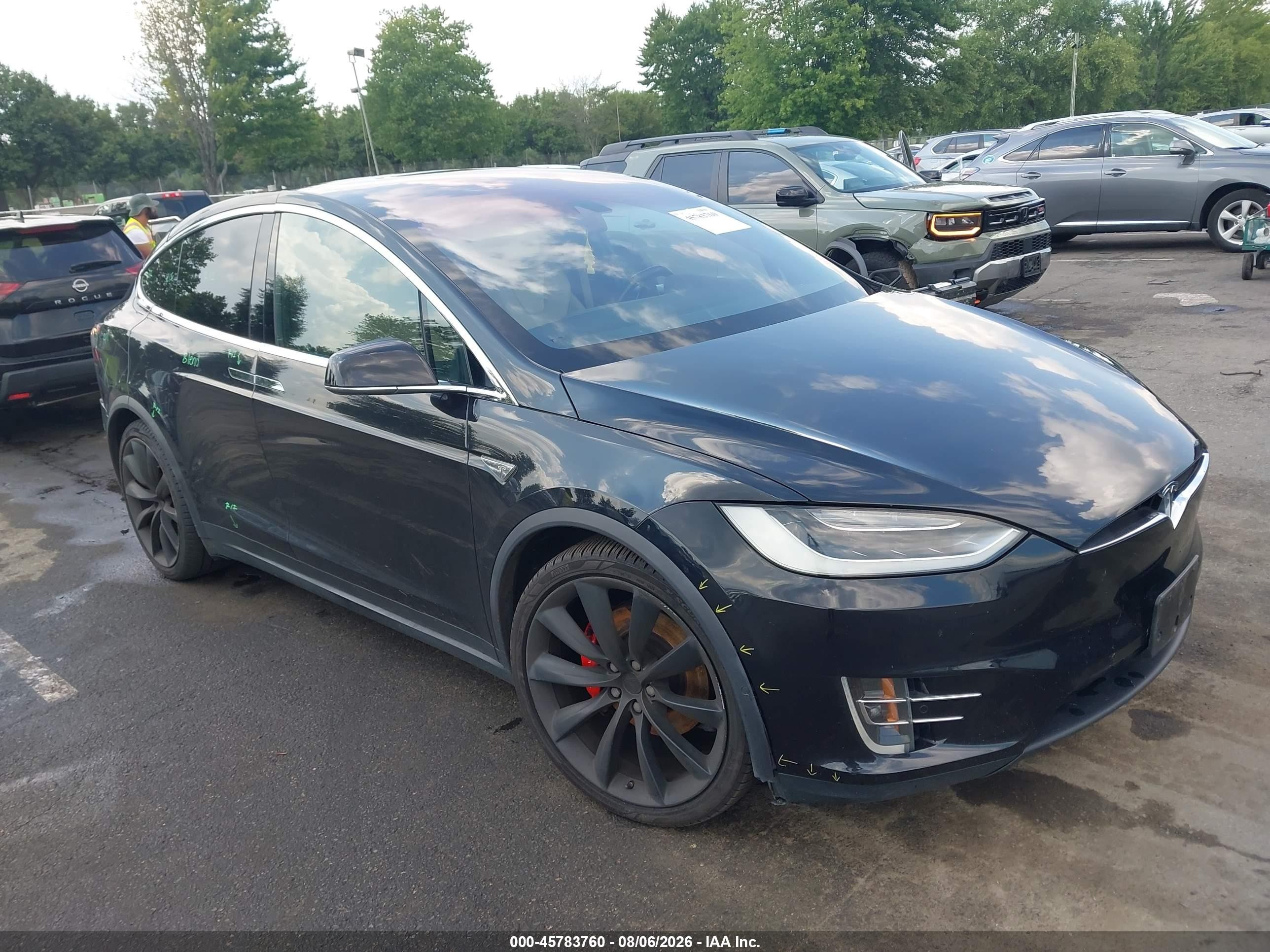 2016 Tesla Model X VIN 5YJXCBE42GF005824 — IAAI salvage auction photo