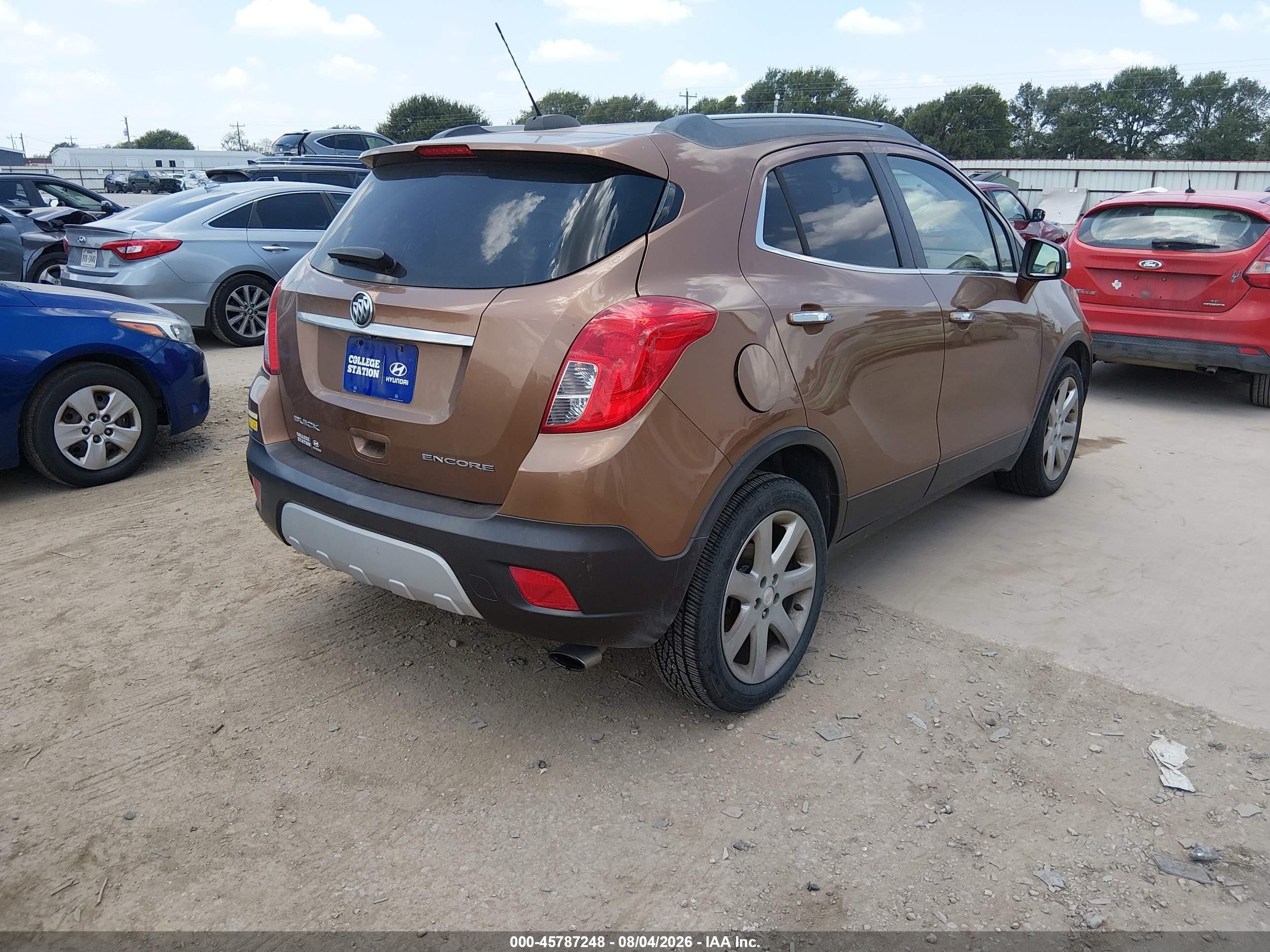2016 Buick Encore VIN KL4CJCSB7GB542585 IAAI salvage auction — Water/Flood, Salvage (Texas), sold $1,600 on 2026-10-10 (photo 4)