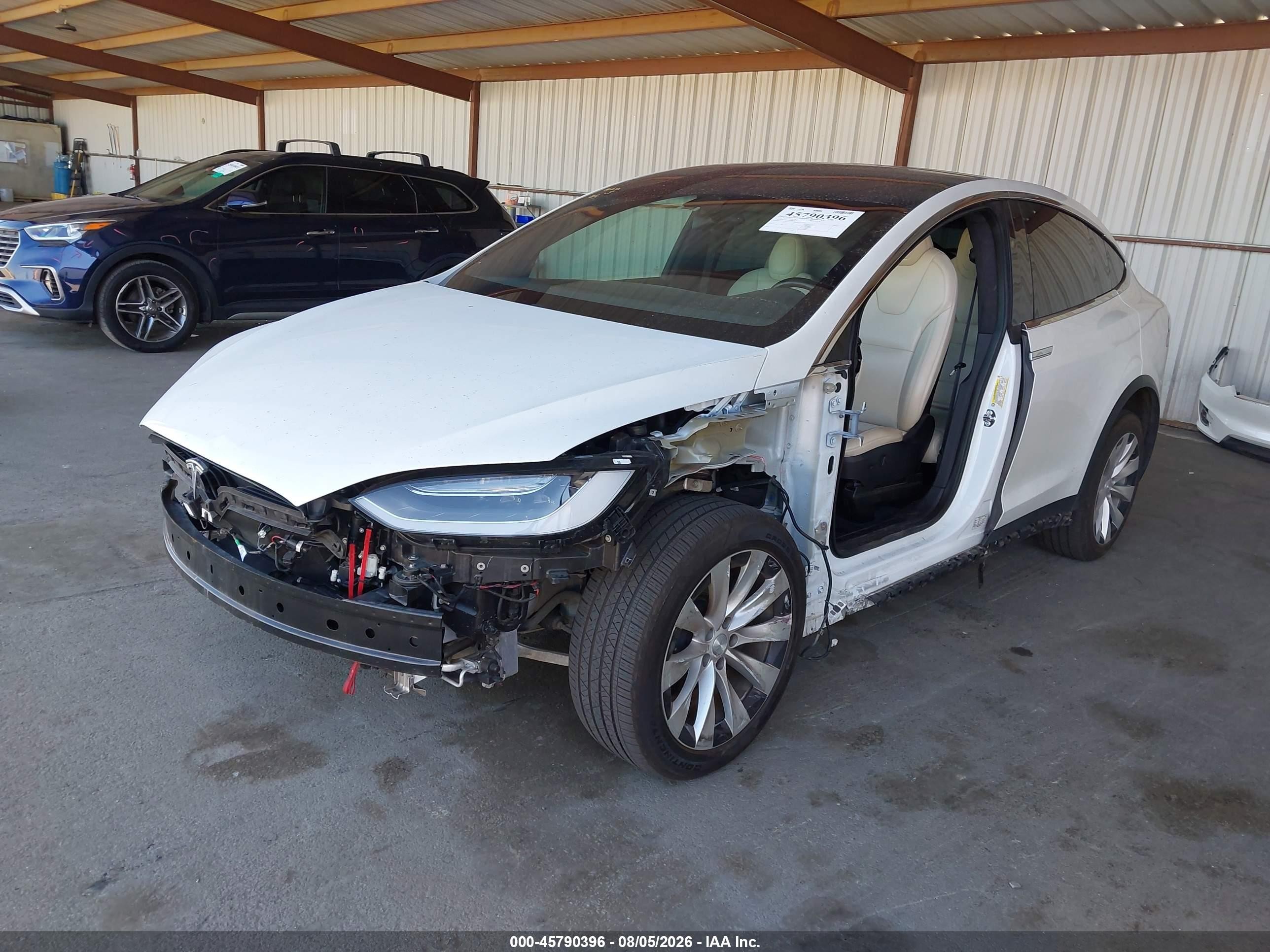 2020 Tesla Model x VIN 5YJXCBE24LF283004 IAAI salvage auction — Unknown, Salvage (California), sold $19,200 on 2026-10-12 (photo 2)