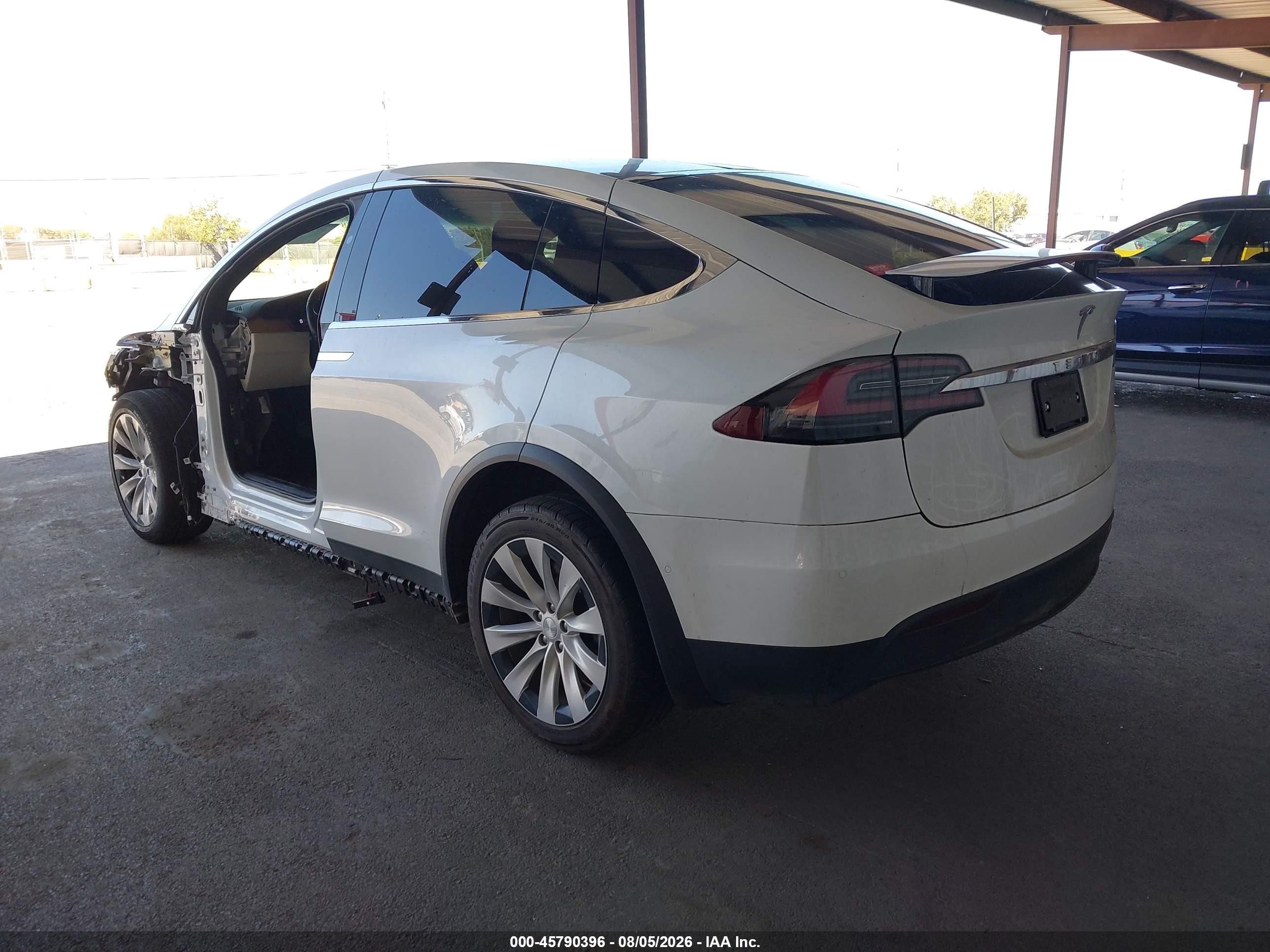 2020 Tesla Model x VIN 5YJXCBE24LF283004 IAAI salvage auction — Unknown, Salvage (California), sold $19,200 on 2026-10-12 (photo 3)