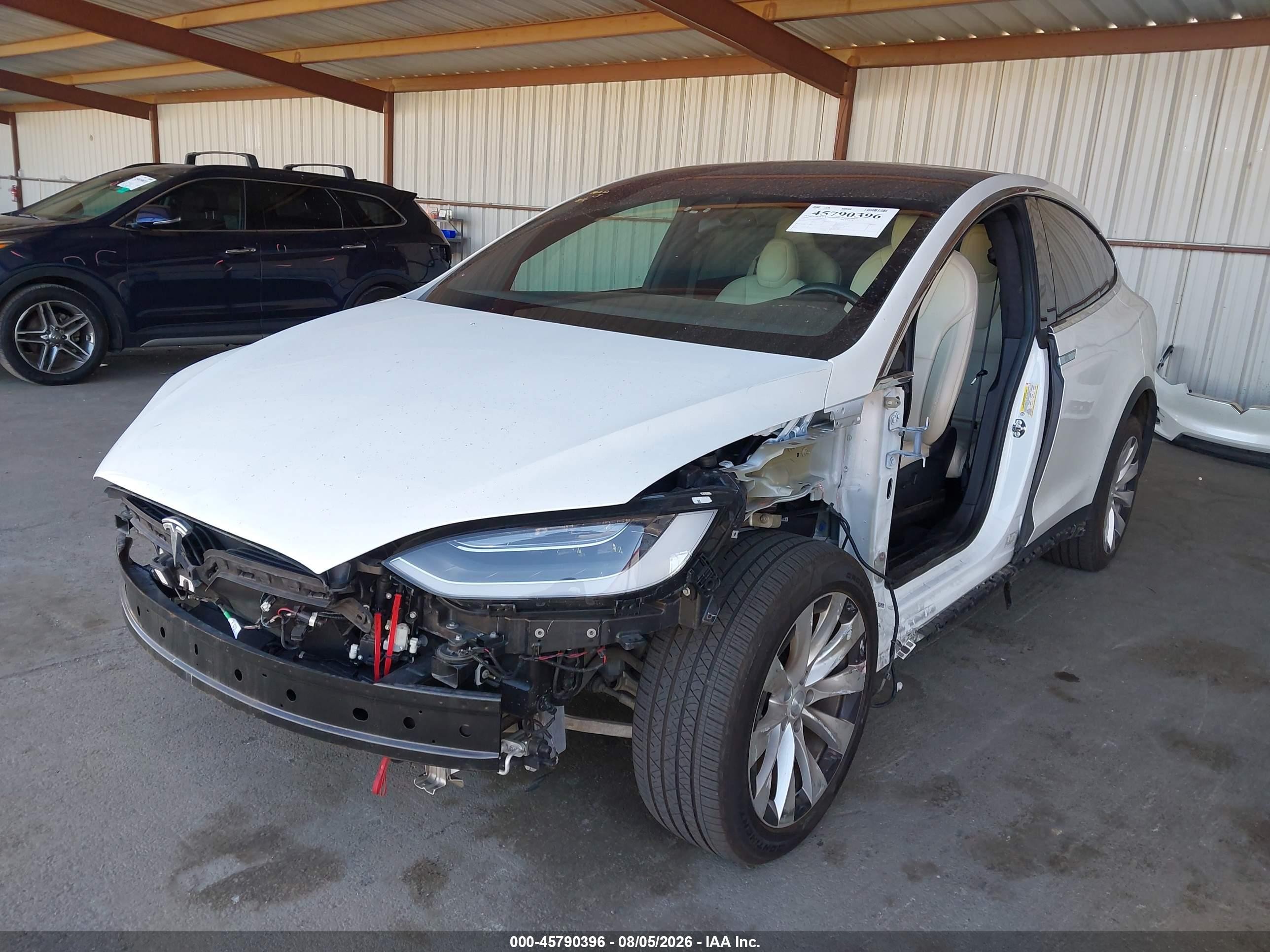 2020 Tesla Model x VIN 5YJXCBE24LF283004 IAAI salvage auction — Unknown, Salvage (California), sold $19,200 on 2026-10-12 (photo 6)