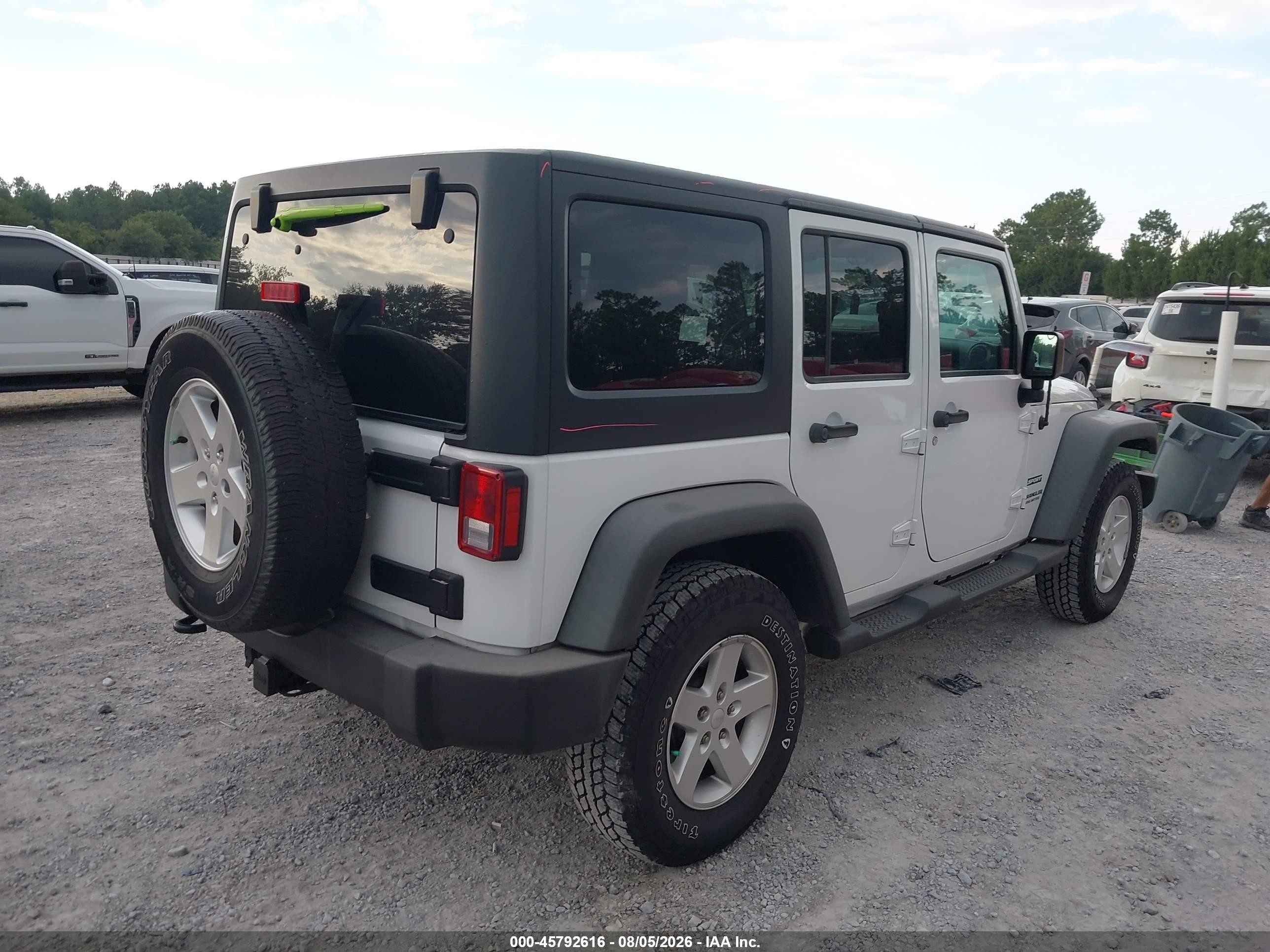 2016 Jeep Wrangler / VIN 1C4BJWDG0GL196983 IAAI salvage auction — Unknown, Rebuildable (Florida), sold $8,000 on 2026-09-03 (photo 4)