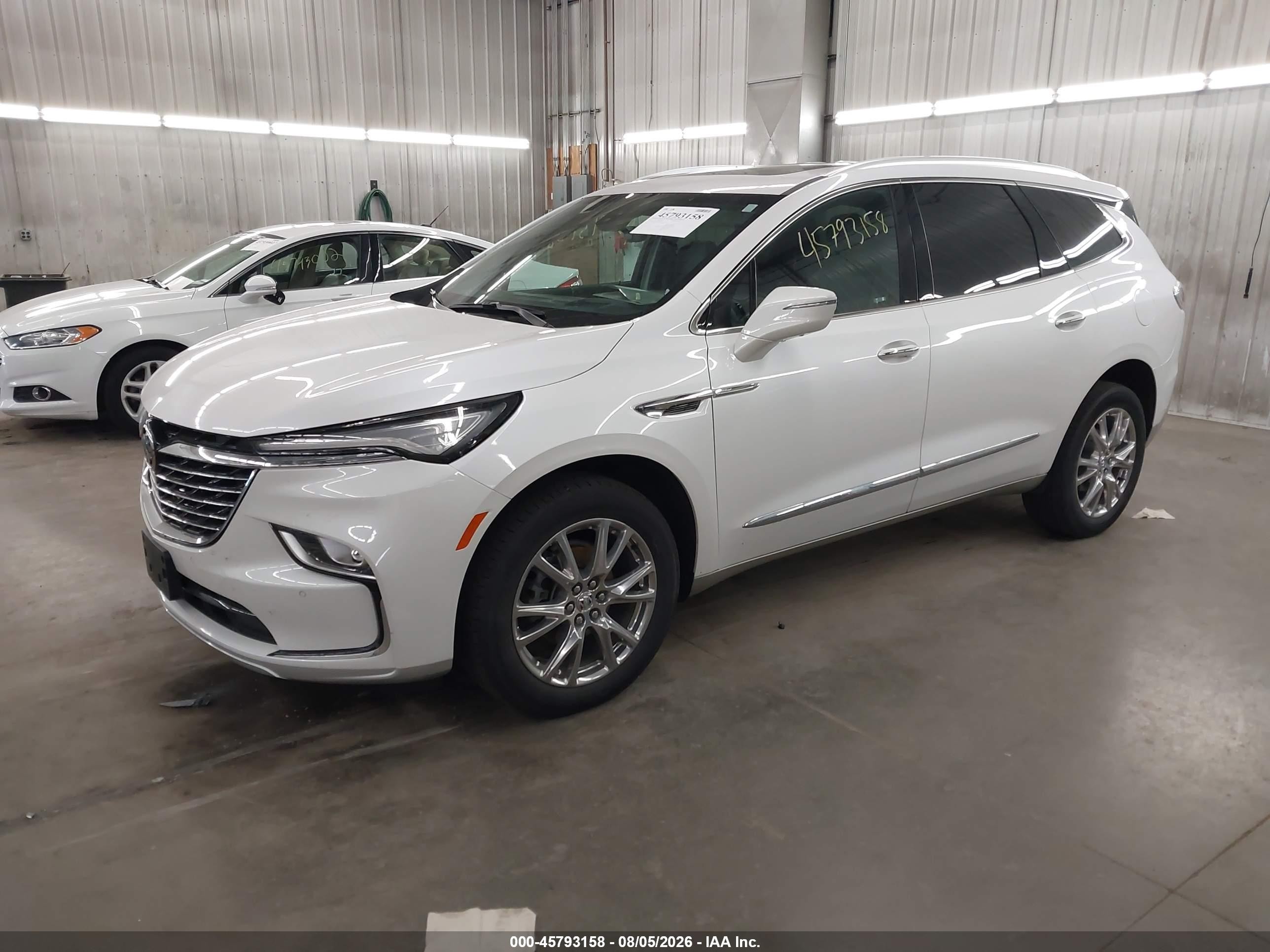 2023 Buick Enclave VIN 5GAEVBKW8PJ134958 IAAI salvage auction — Side, Salvage (Minnesota), sold $9,200 on 2026-09-23 (photo 2)