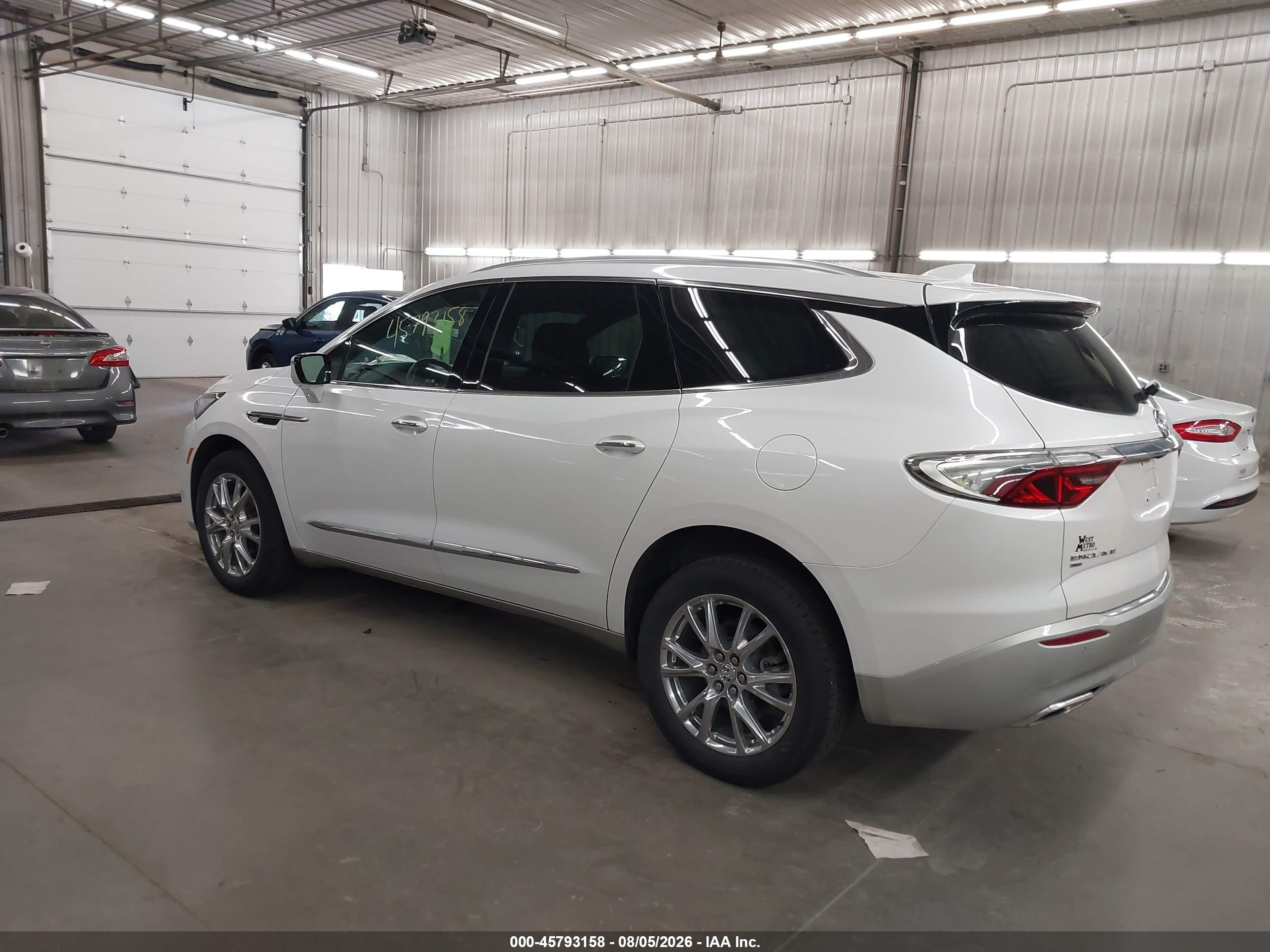 2023 Buick Enclave VIN 5GAEVBKW8PJ134958 IAAI salvage auction — Side, Salvage (Minnesota), sold $9,200 on 2026-09-23 (photo 3)