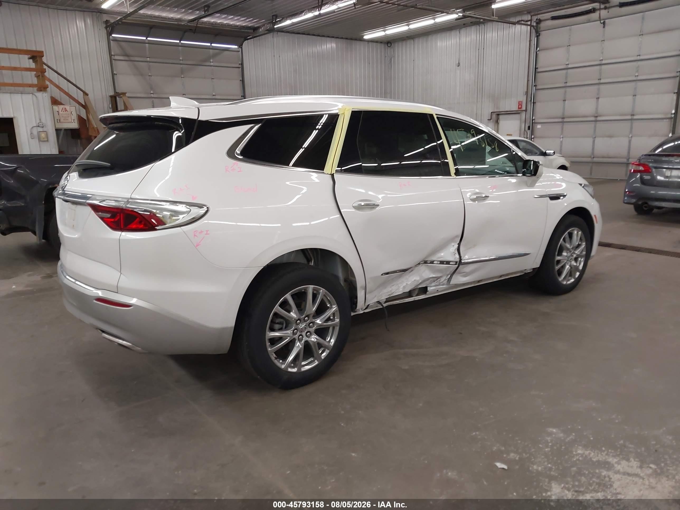 2023 Buick Enclave VIN 5GAEVBKW8PJ134958 IAAI salvage auction — Side, Salvage (Minnesota), sold $9,200 on 2026-09-23 (photo 4)