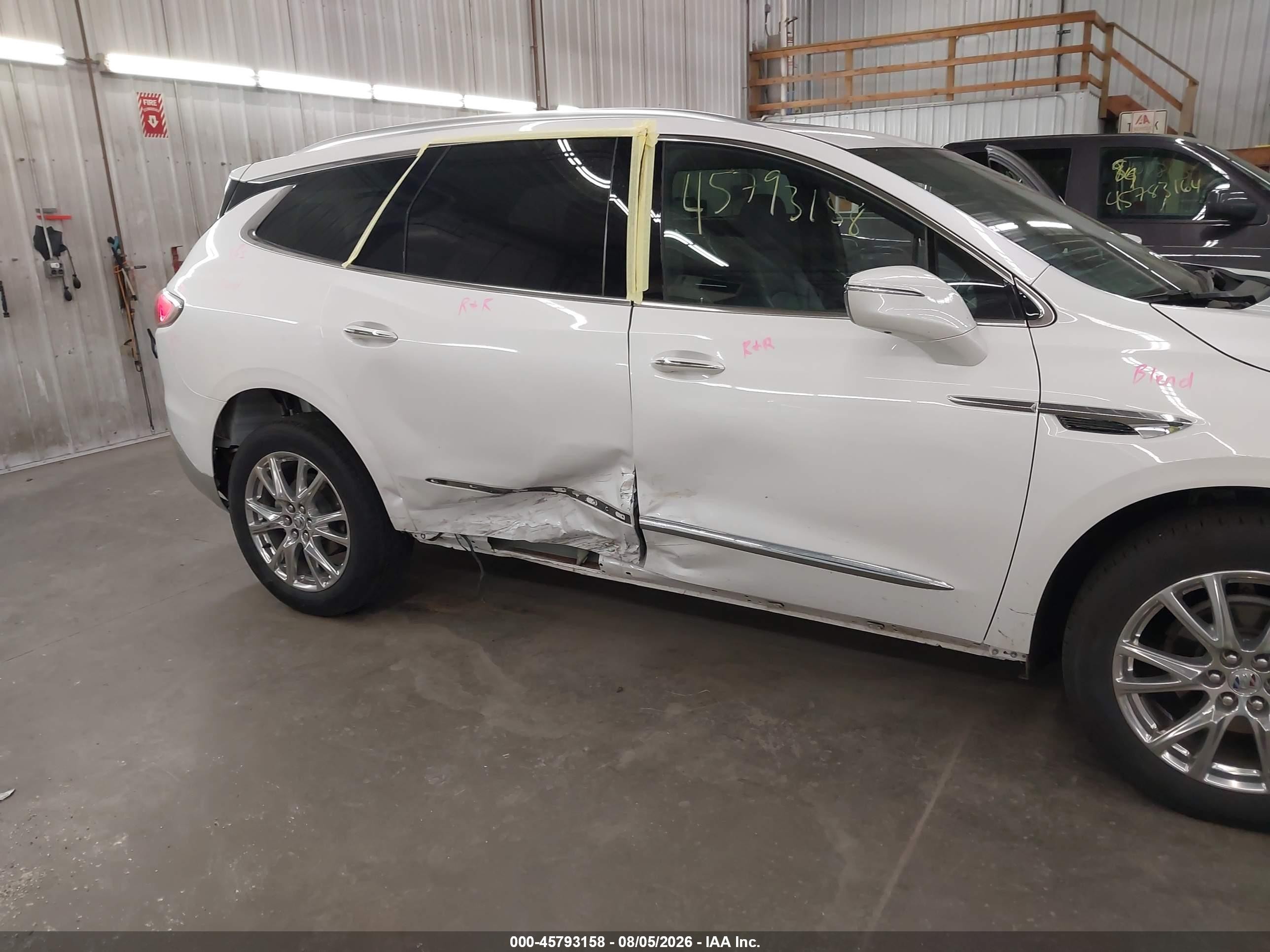 2023 Buick Enclave VIN 5GAEVBKW8PJ134958 IAAI salvage auction — Side, Salvage (Minnesota), sold $9,200 on 2026-09-23 (photo 6)