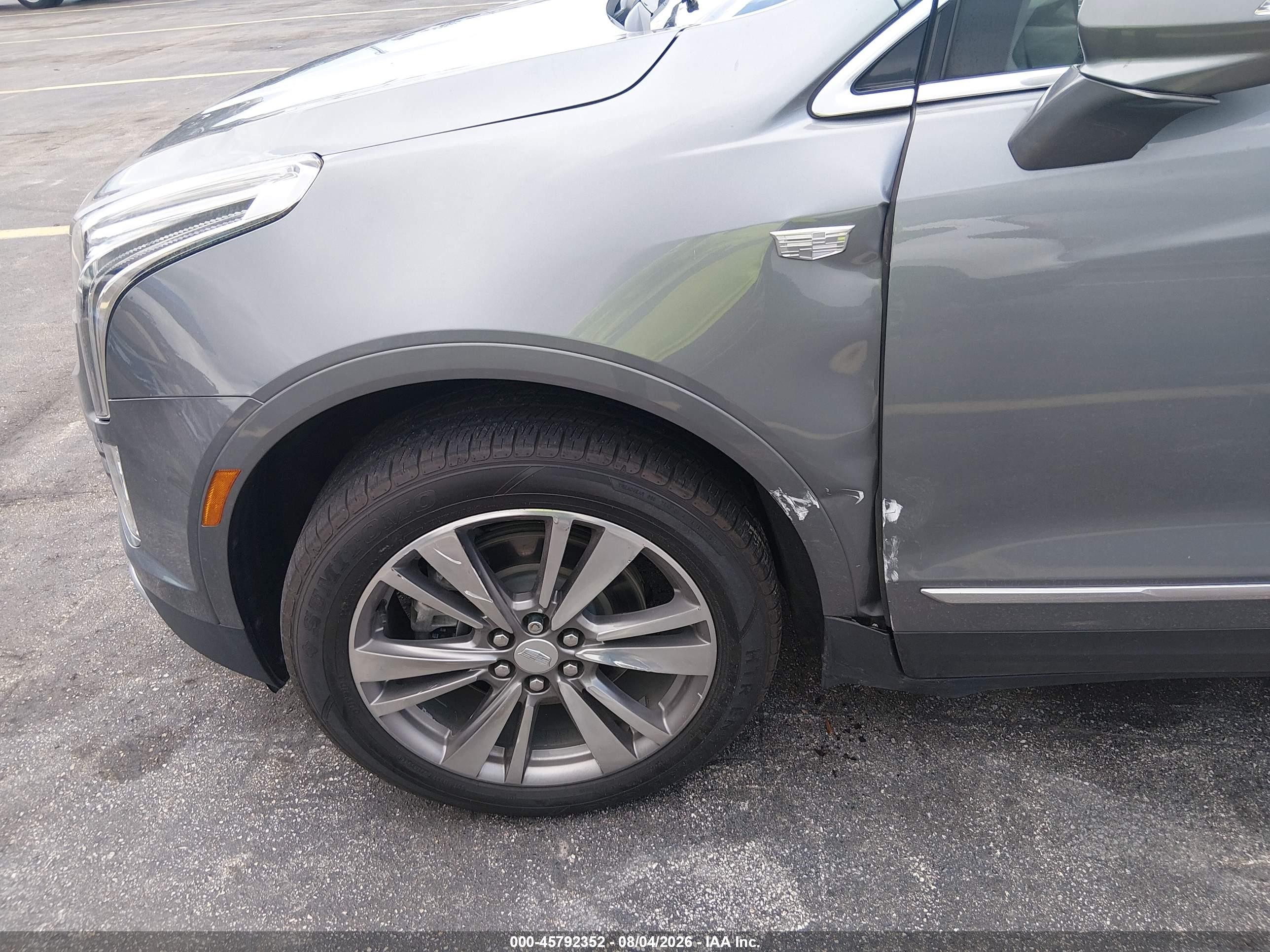 2021 Cadillac Xt5 VIN 1GYKNCRS7MZ117585 IAAI salvage auction — Side, Rebuildable (Florida), sold $7,850 on 2026-10-10 (photo 6)