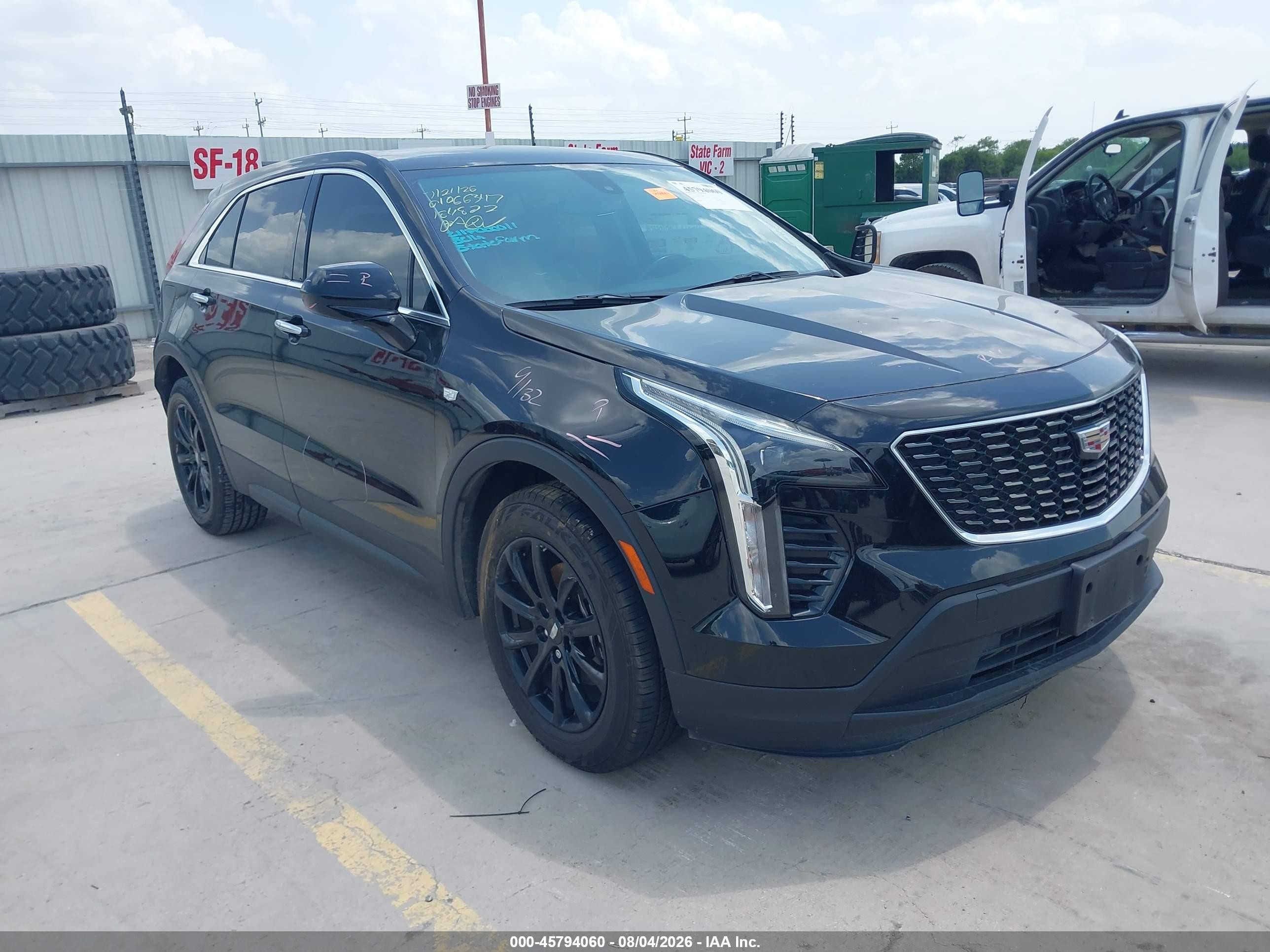 2019 Cadillac XT4 VIN 1GYAZAR45KF184822 — IAAI salvage auction photo