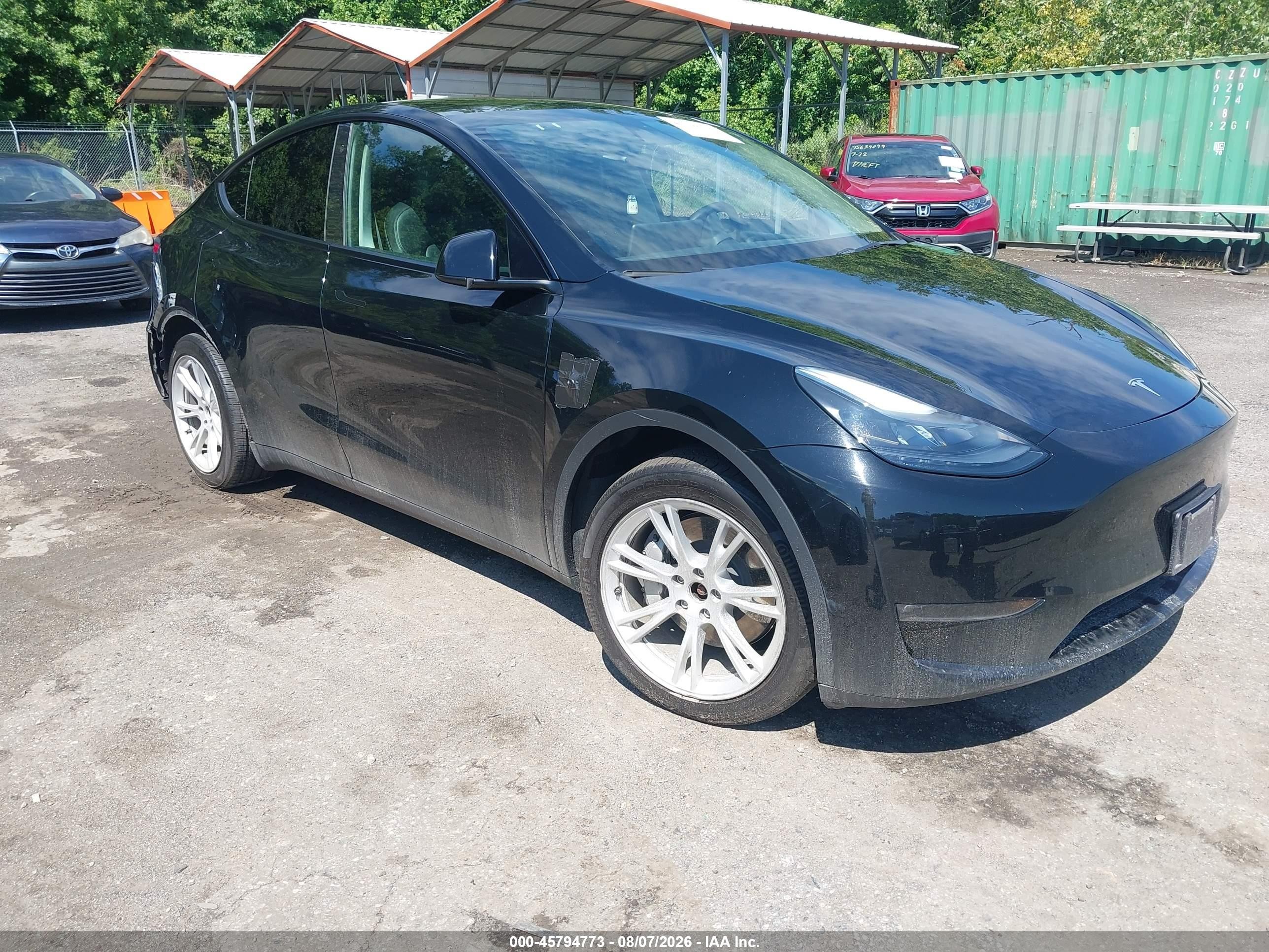 2023 Tesla Model Y VIN 7SAYGAEE9PF788834 — IAAI salvage auction photo