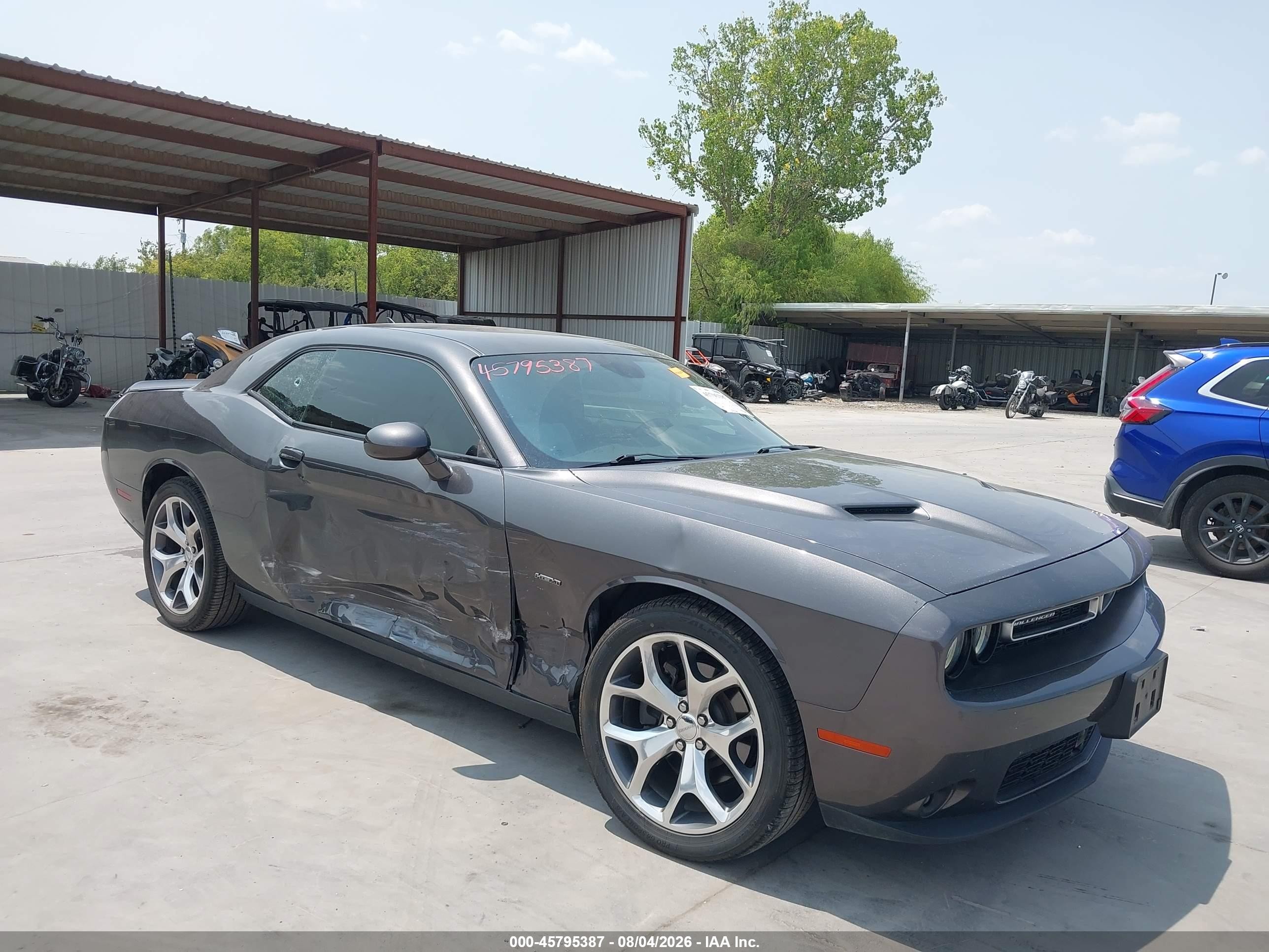 2016 Dodge Challenger VIN 2C3CDZBT1GH137990 IAAI salvage auction — Side, Original (Texas), sold $10,900 on 2026-10-08 (photo 1)
