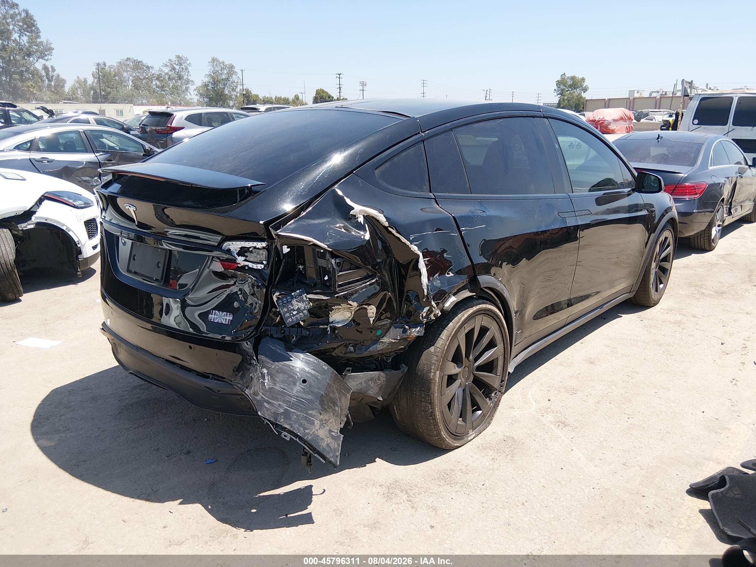 2022 Tesla Model x VIN 7SAXCBE69NF357171 IAAI salvage auction — Rear End, Salvage (California), sold $25,825 on 2026-08-27 (photo 4)