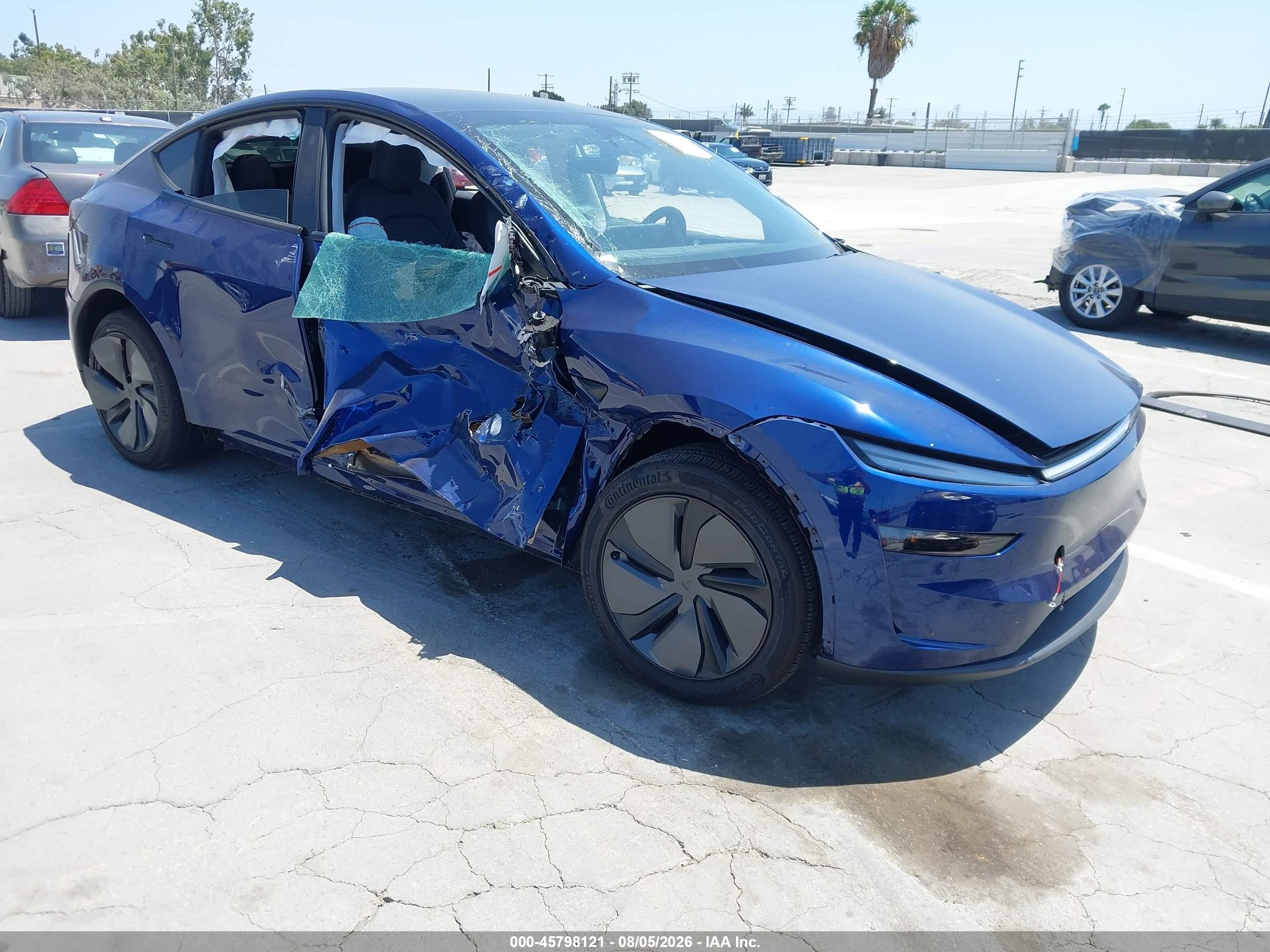 2026 Tesla Model Y VIN 7SAYGDED4TF430804 — IAAI salvage auction photo