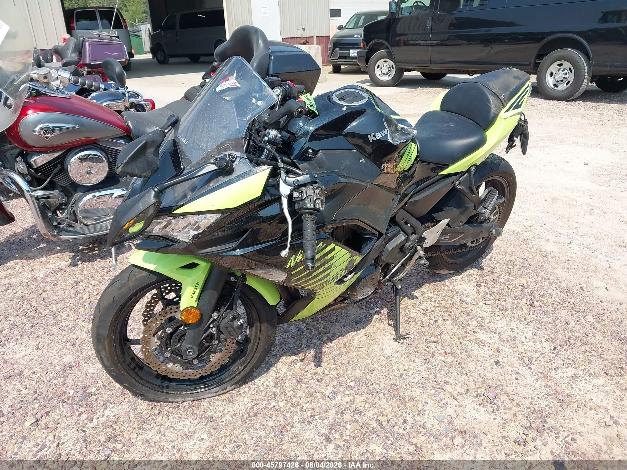 2026 Kawasaki Ninja VIN ML5EXEP14TDAJ6192 IAAI salvage auction — Side, Junk Bill Of Sale Mv2459 (Wisconsin), sold $275 on 2026-09-09 (photo 2)