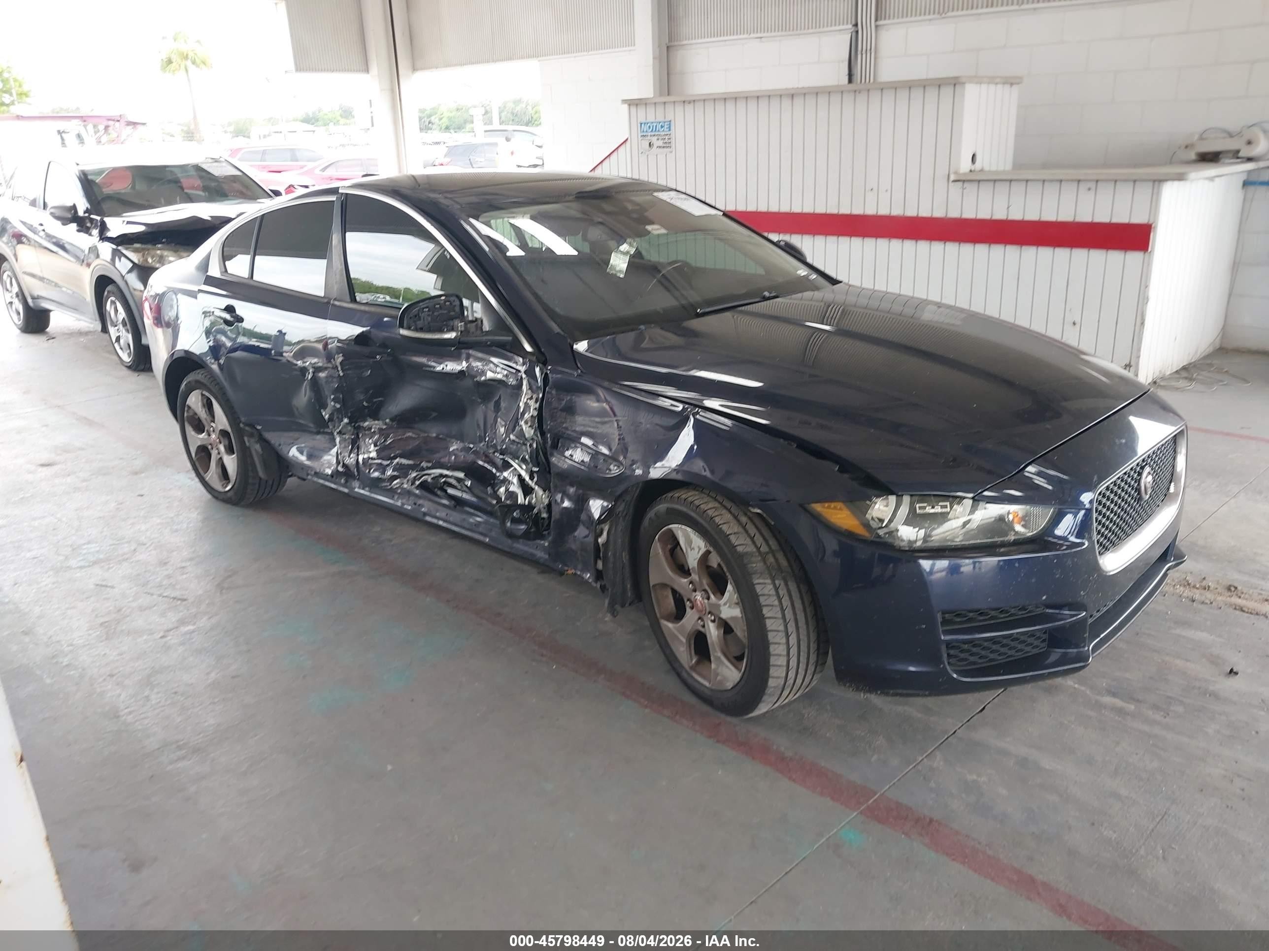 2018 Jaguar Xe VIN SAJAR4FX1JCP34833 IAAI salvage auction — Side, Rebuildable (Florida), sold $650 on 2026-09-09 (photo 1)