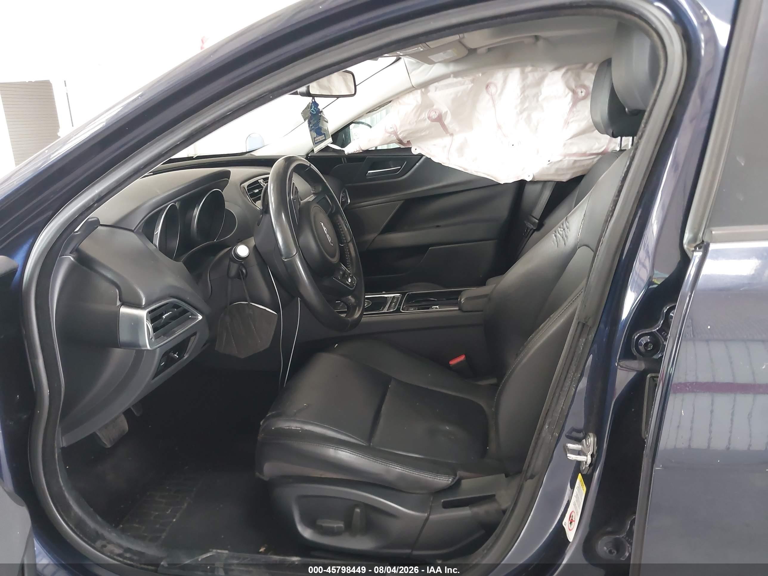 2018 Jaguar Xe VIN SAJAR4FX1JCP34833 IAAI salvage auction — Side, Rebuildable (Florida), sold $650 on 2026-09-09 (photo 5)
