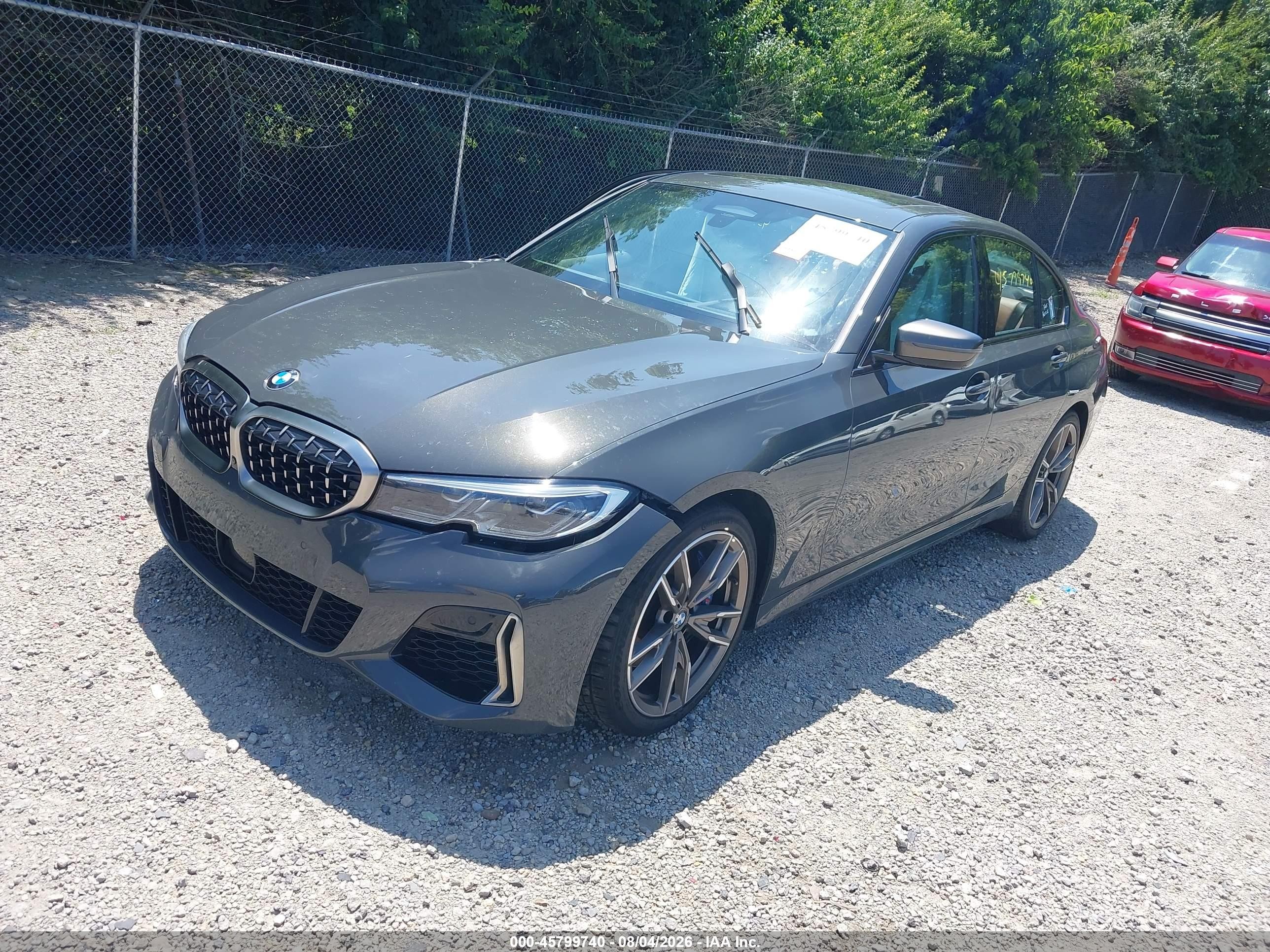 2020 BMW M340i VIN WBA5U9C05LFH02469 IAAI salvage auction — Side, Salvage (Ohio), sold $17,600 on 2026-09-11 (photo 2)