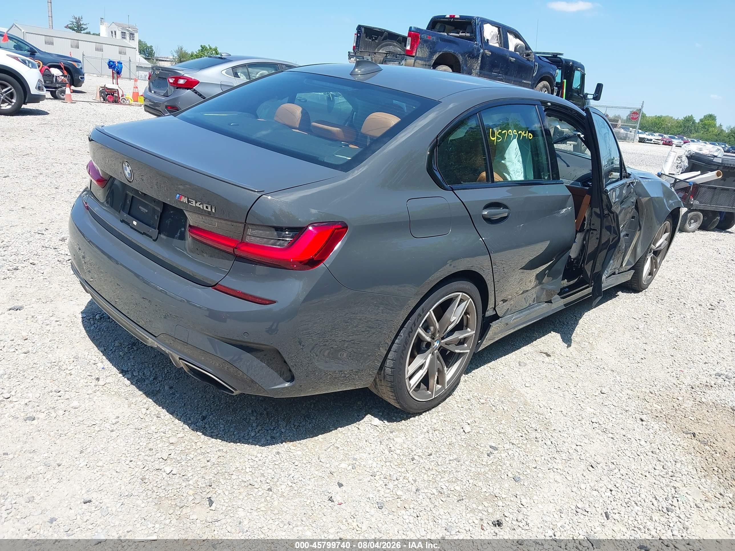 2020 BMW M340i VIN WBA5U9C05LFH02469 IAAI salvage auction — Side, Salvage (Ohio), sold $17,600 on 2026-09-11 (photo 4)