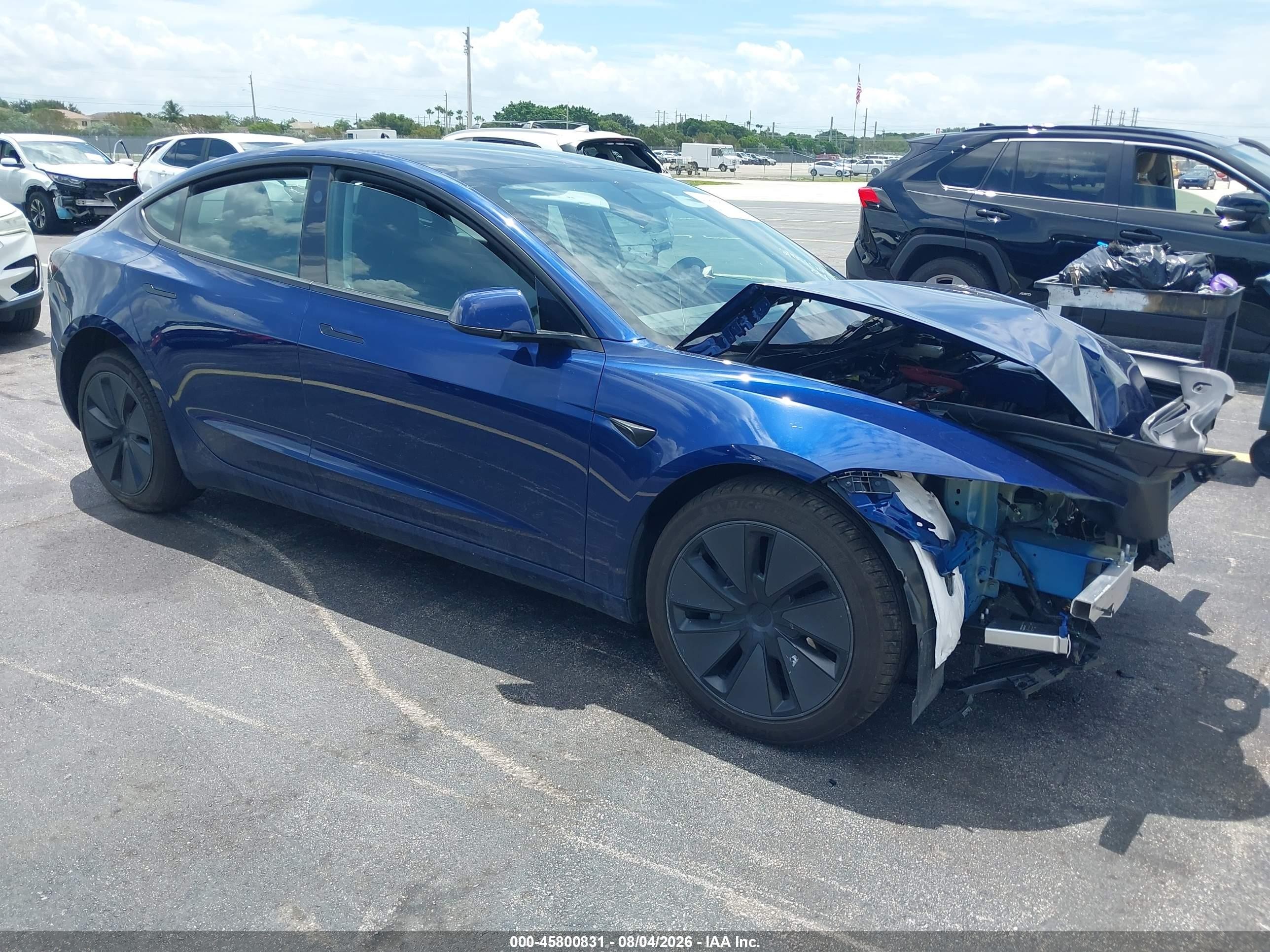 2025 Tesla Model 3 VIN 5YJ3E1EA8SF014092 — IAAI salvage auction photo