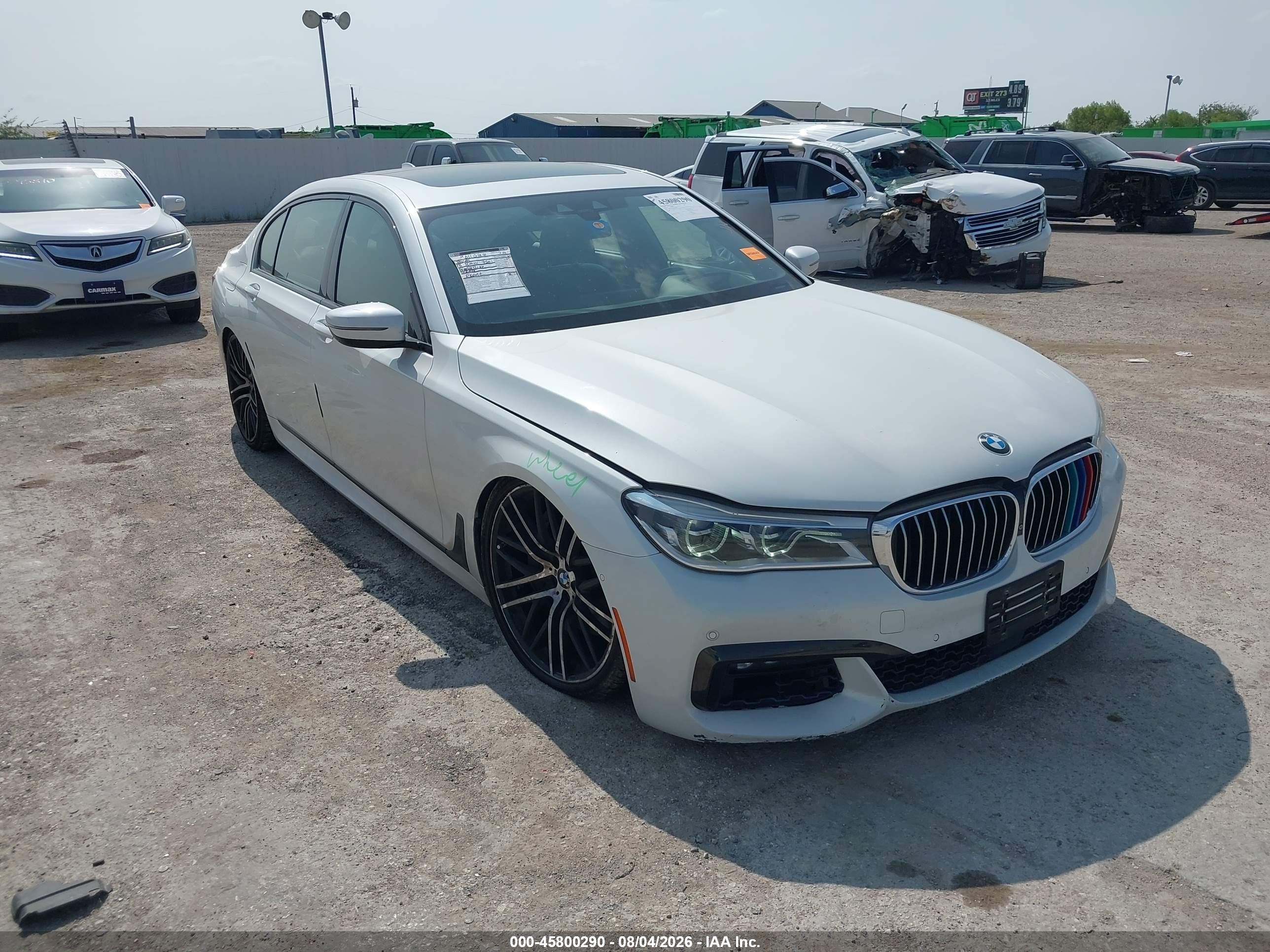 2018 BMW 7 Series VIN WBA7F0C57JGM23328 — IAAI salvage auction photo