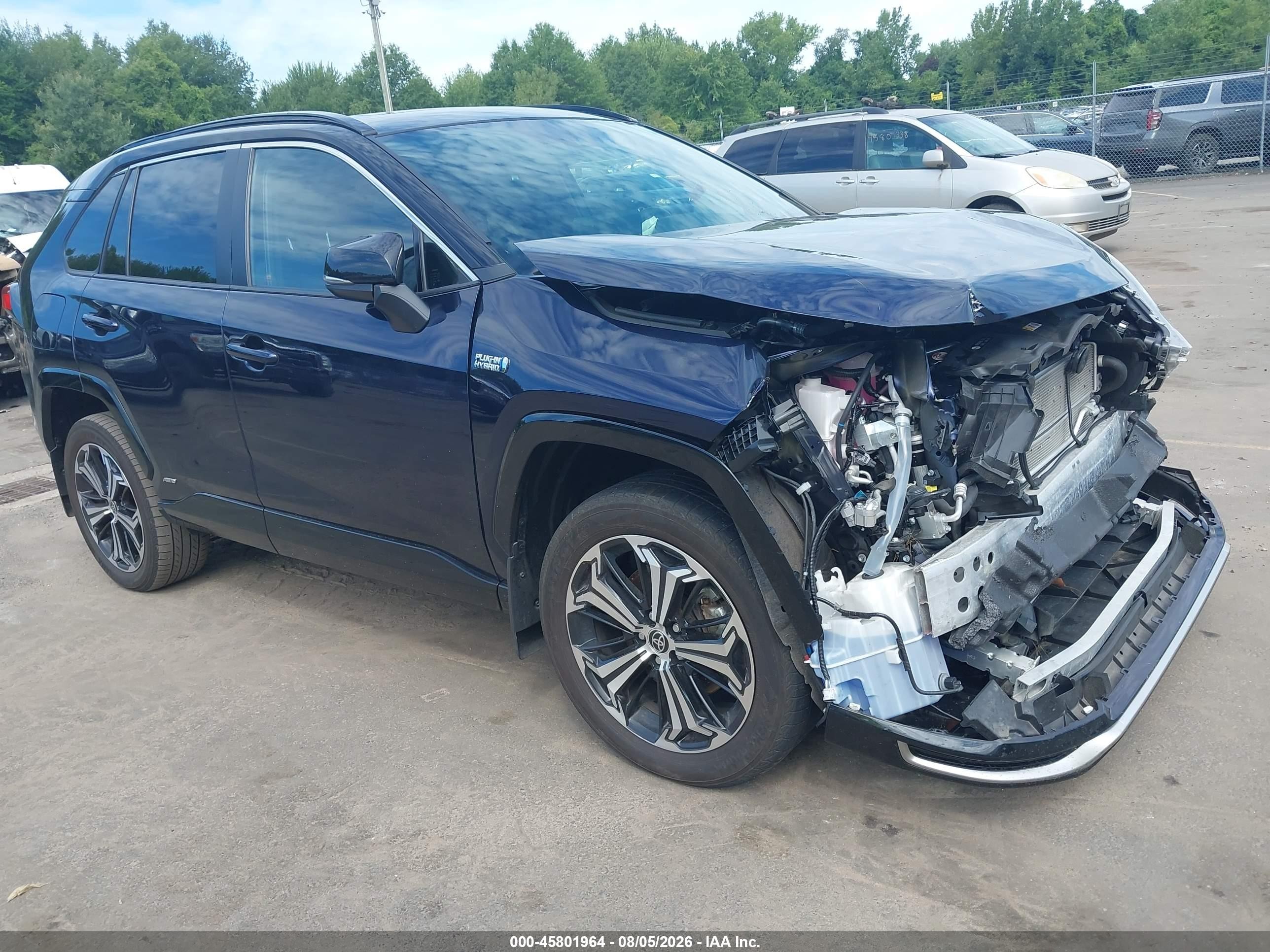 2023 Toyota RAV4 Prime VIN JTMEB3FV2PD125704 — IAAI salvage auction photo