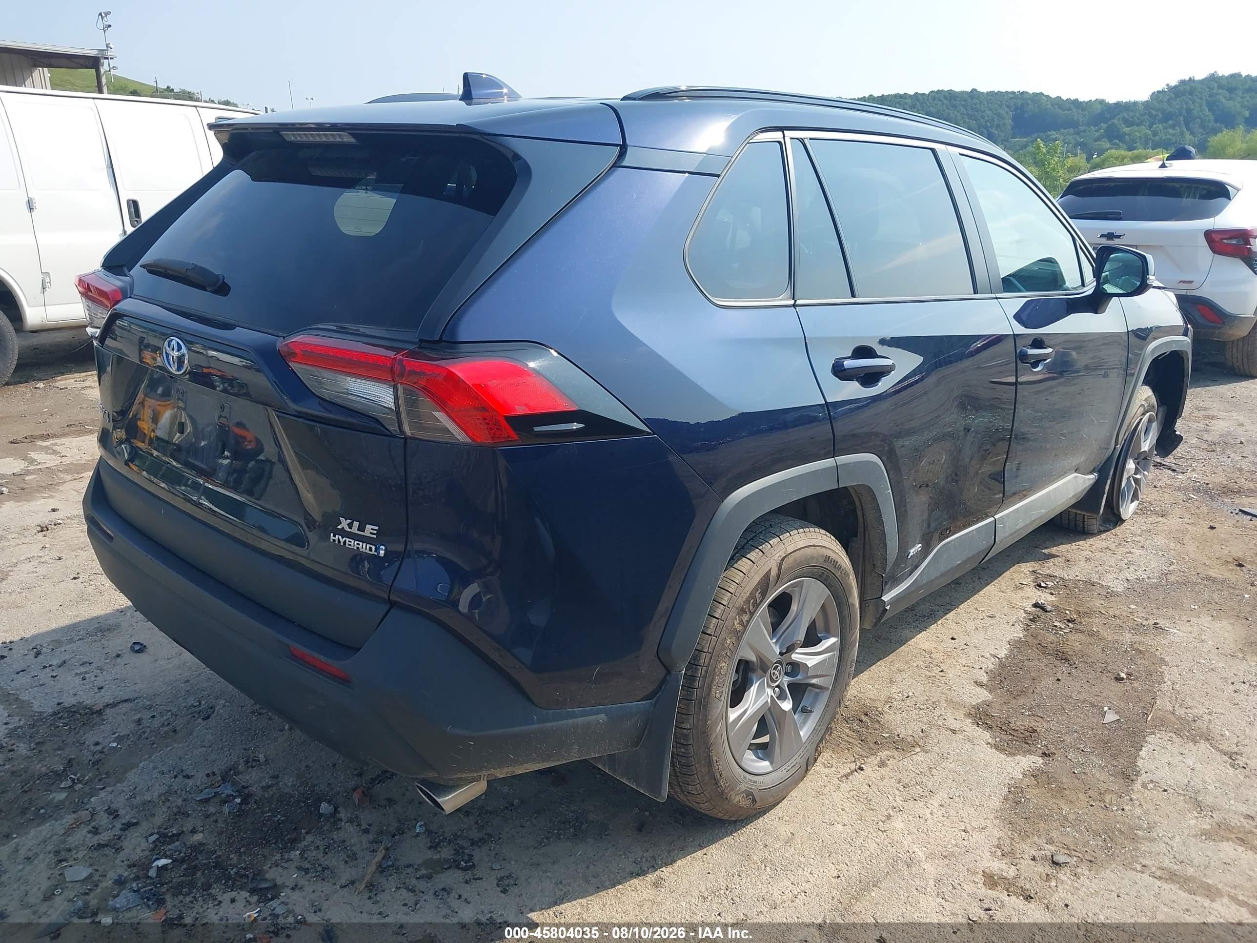 2023 Toyota RAV4 Hybrid VIN 4T3RWRFV1PU094327 IAAI salvage auction — Side, Wait Title, sold $13,000 on 2026-09-20 (photo 4)