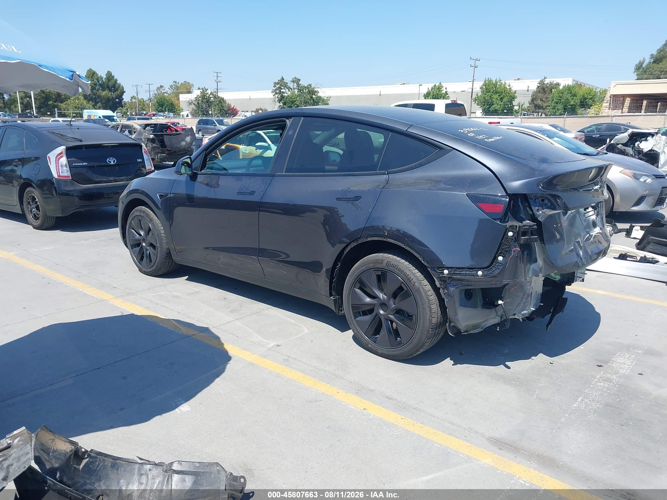 2025 Tesla Model y VIN 7SAYGDED5SF314090 IAAI salvage auction — Rear End, Salvage (California), sold $12,400 on 2026-09-05 (photo 3)