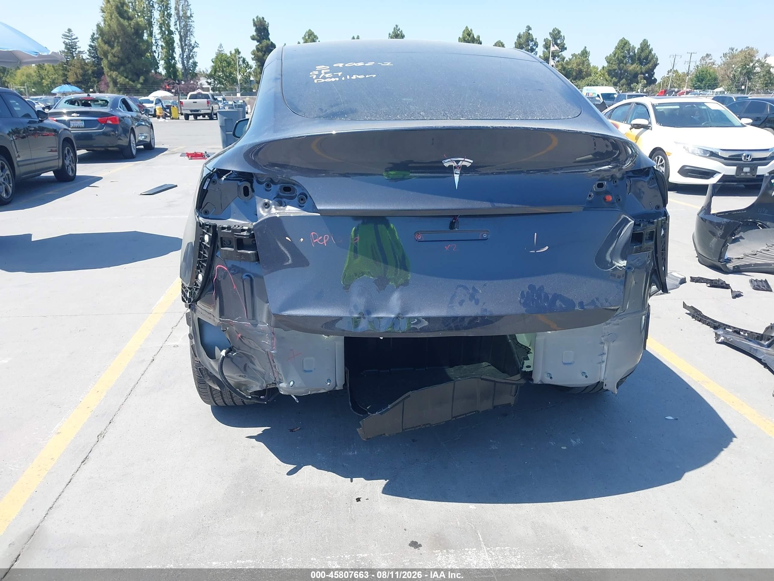 2025 Tesla Model y VIN 7SAYGDED5SF314090 IAAI salvage auction — Rear End, Salvage (California), sold $12,400 on 2026-09-05 (photo 6)