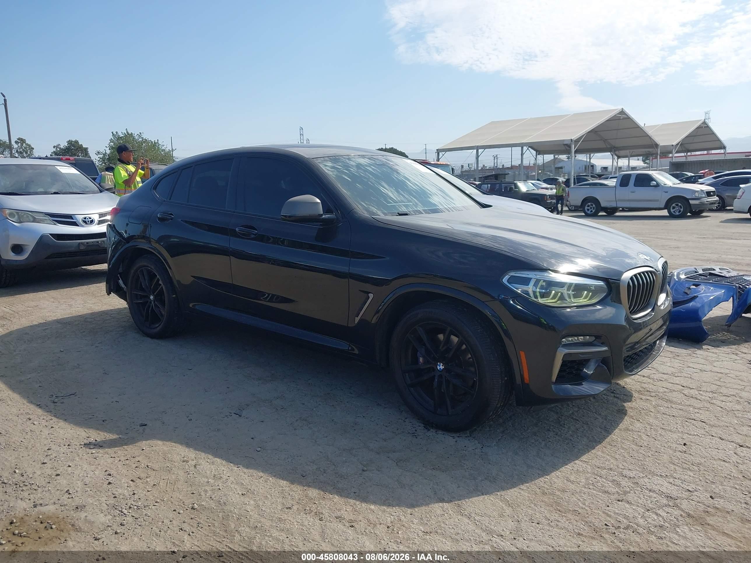 2020 BMW X4 VIN 5UX2V5C0XL9B25057 — IAAI salvage auction photo