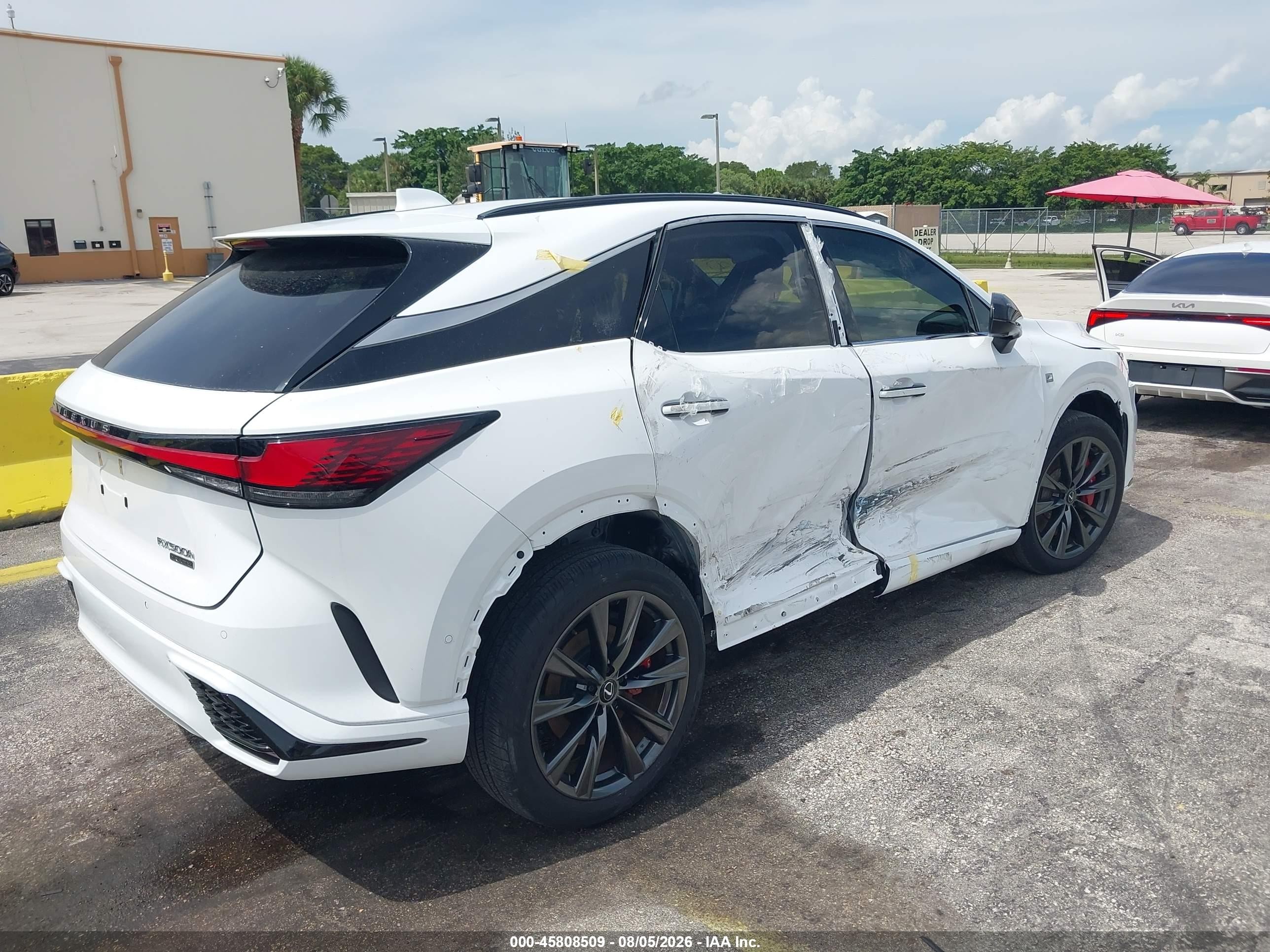 2024 Lexus Rx VIN 2T2BAMCA0RC040899 IAAI salvage auction — Side, Salvage Title (California), sold $30,300 on 2026-08-27 (photo 4)