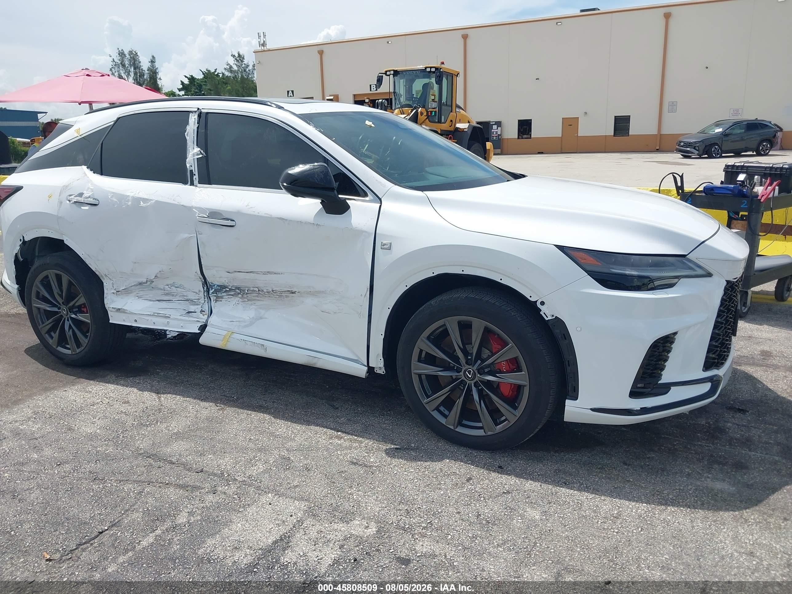 2024 Lexus Rx VIN 2T2BAMCA0RC040899 IAAI salvage auction — Side, Salvage Title (California), sold $30,300 on 2026-08-27 (photo 6)