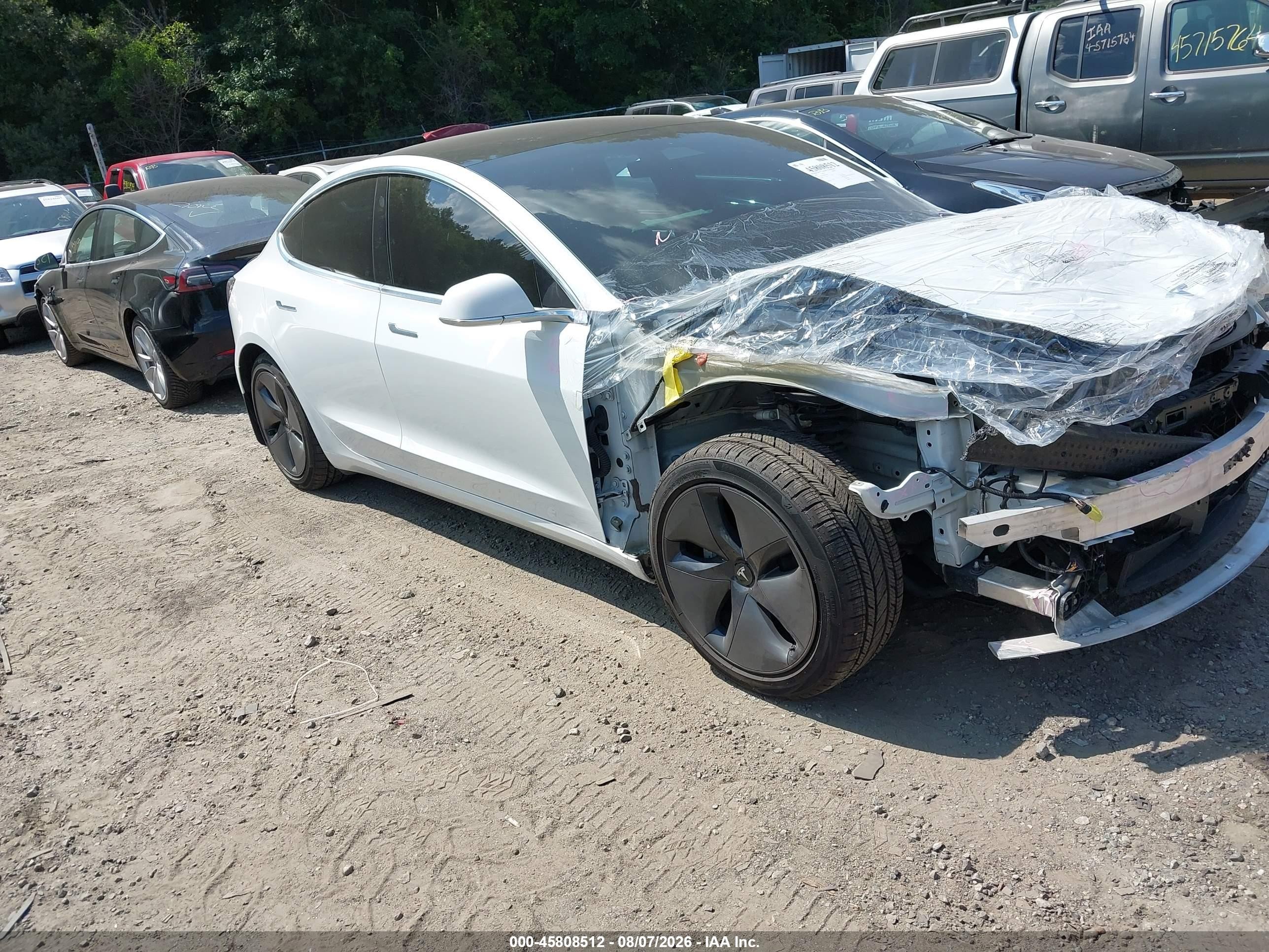 2020 Tesla Model 3 VIN 5YJ3E1EB6LF720259 — IAAI salvage auction photo