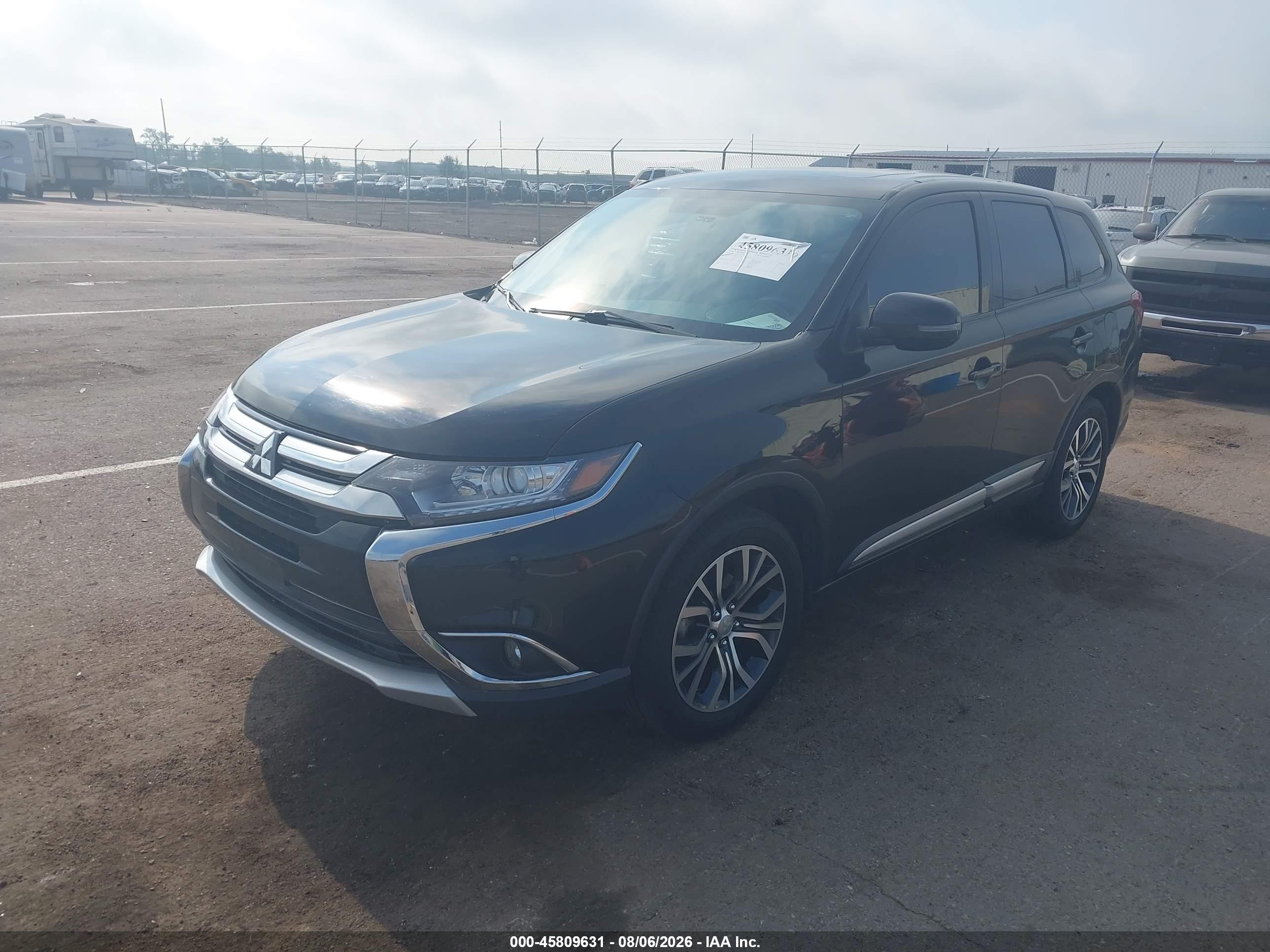 2018 Mitsubishi Outlander VIN JA4AZ3A31JZ016316 IAAI salvage auction — Side, Regular (South Dakota), sold $2,200 on 2026-09-12 (photo 2)