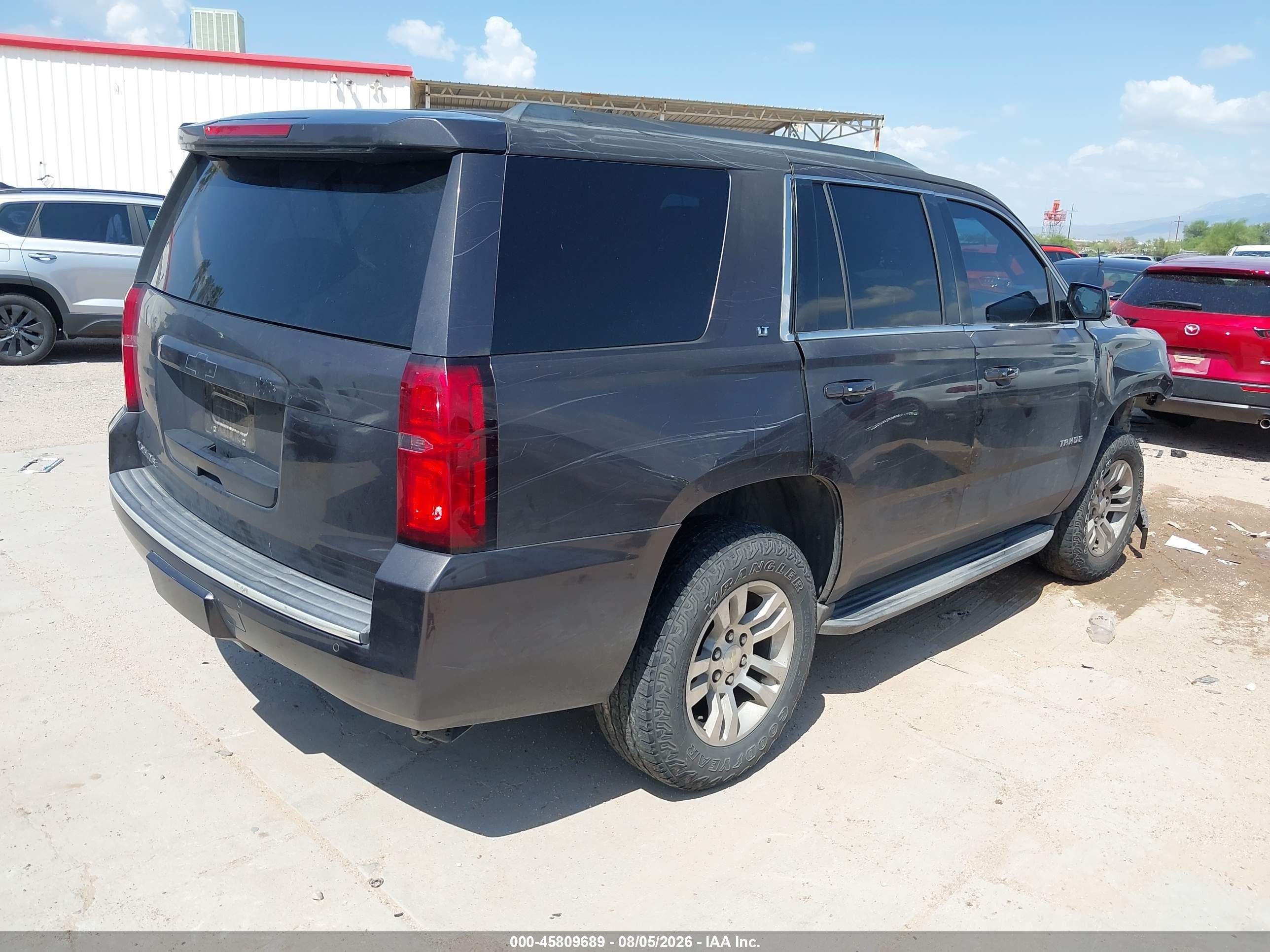 2015 Chevrolet Tahoe VIN 1GNSCBKC1FR180863 IAAI salvage auction — Unknown, Salvage (Arizona), sold $5,000 on 2026-10-11 (photo 4)